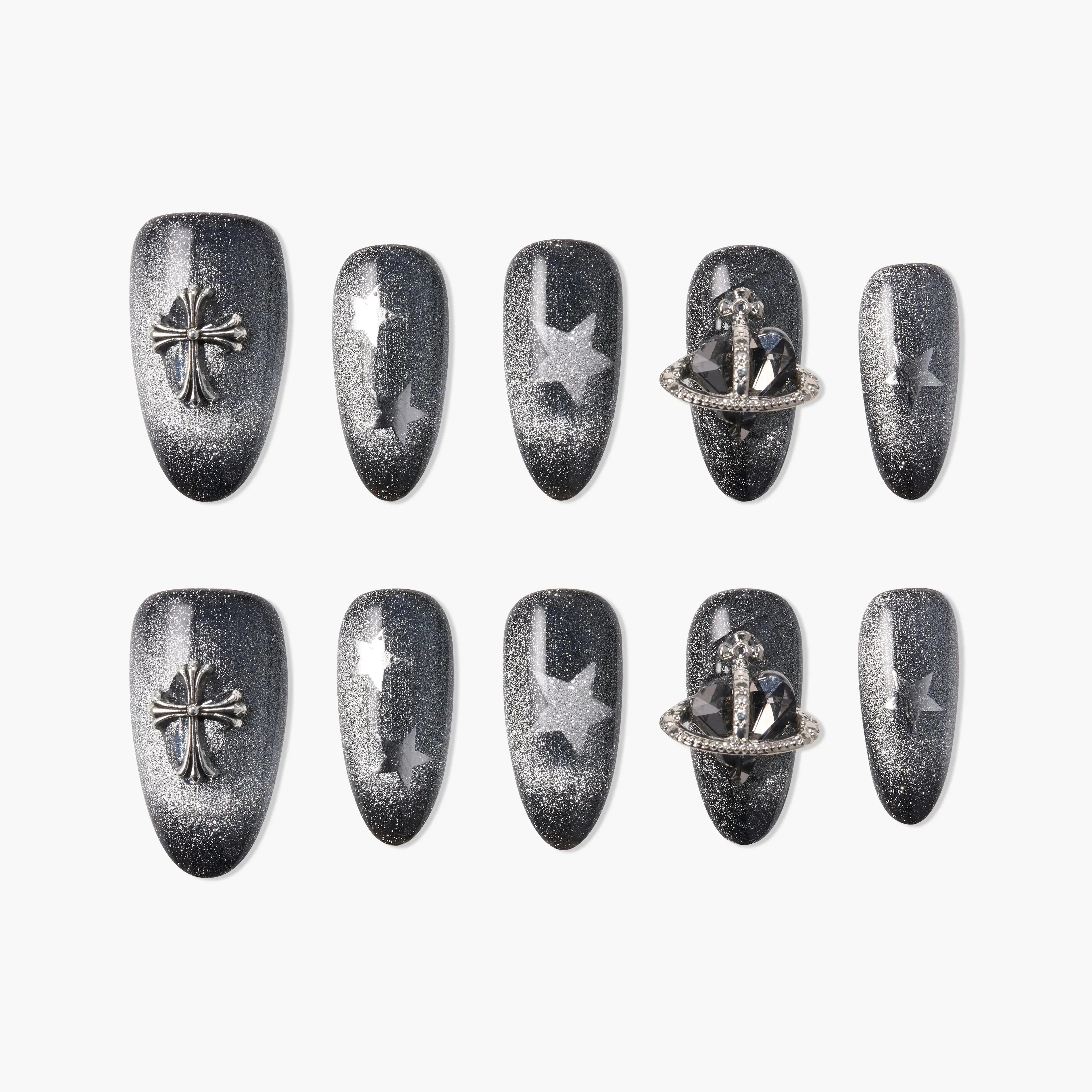 Black glitter press-on nails with silver cross, star, and planet charms, elegant nail art