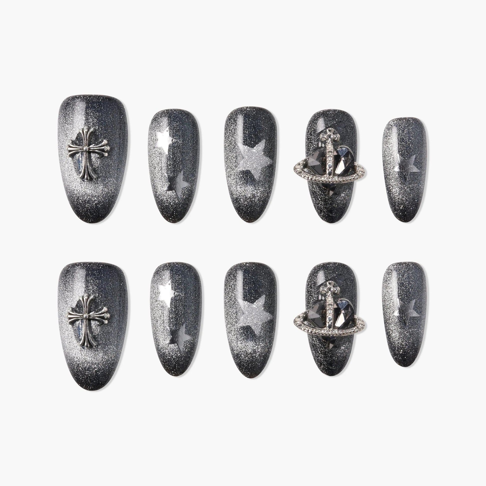 Black glitter press-on nails with silver cross, star, and planet charms, elegant nail art