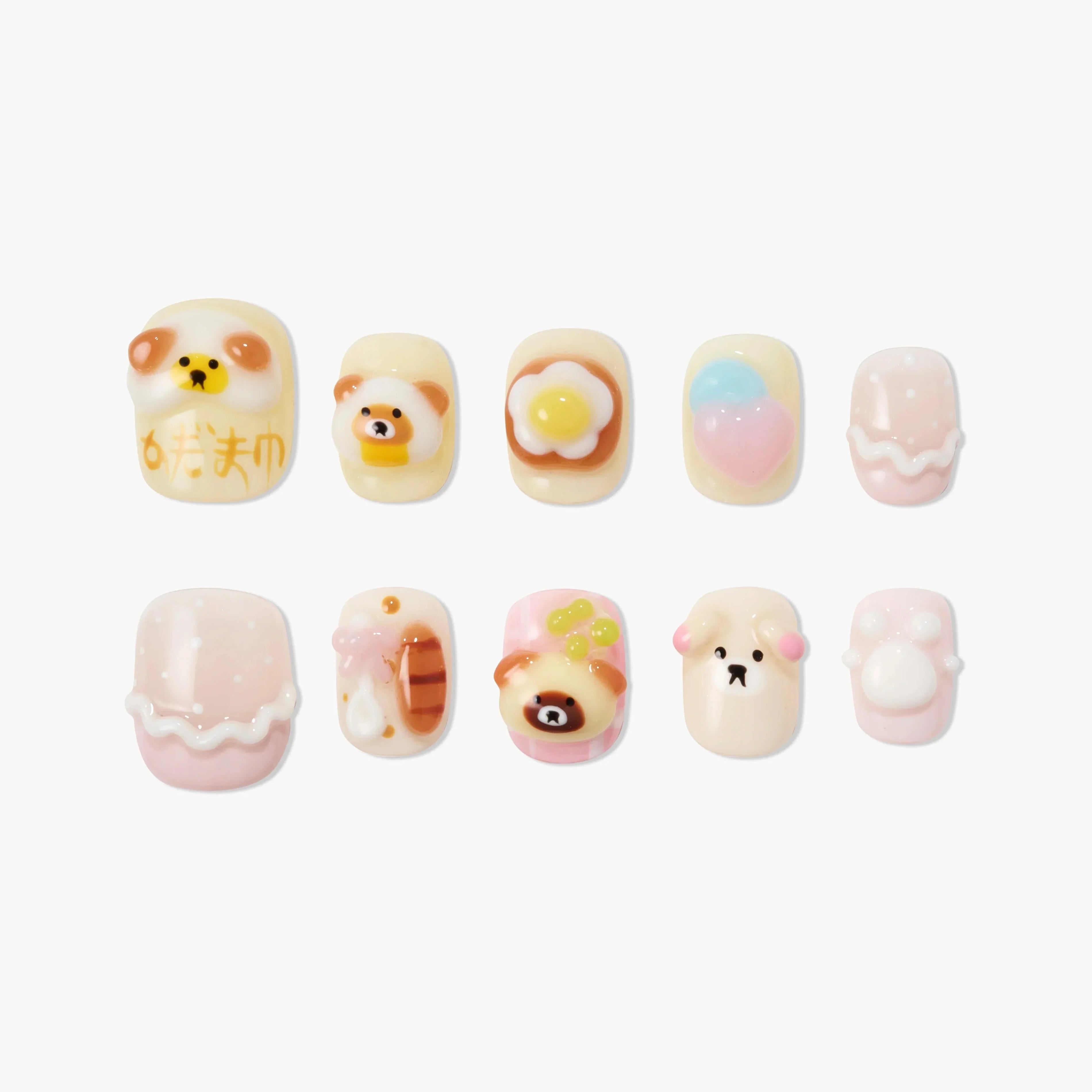 Cute handmade press-on nails with bear, heart, egg designs in pastel colors, kawaii nail art