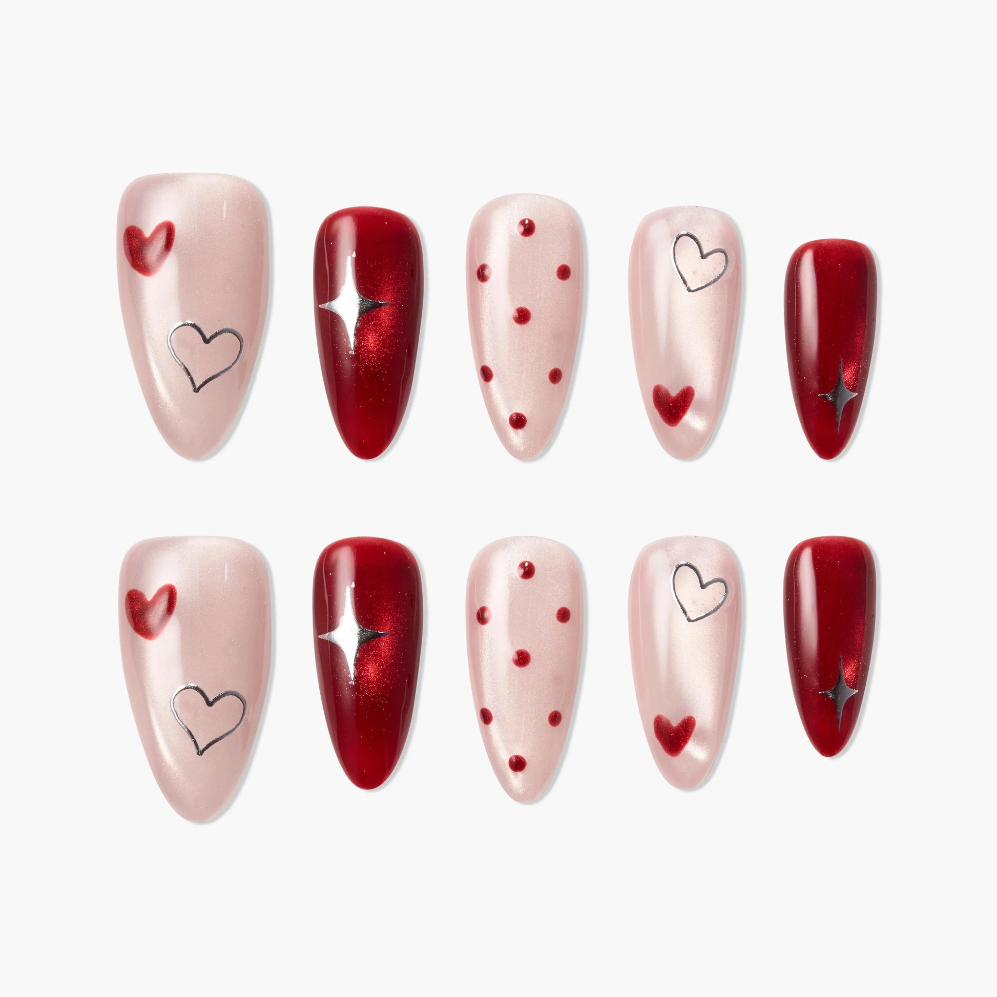 Handmade press-on nails set with red and pink heart, polka dot, and star designs