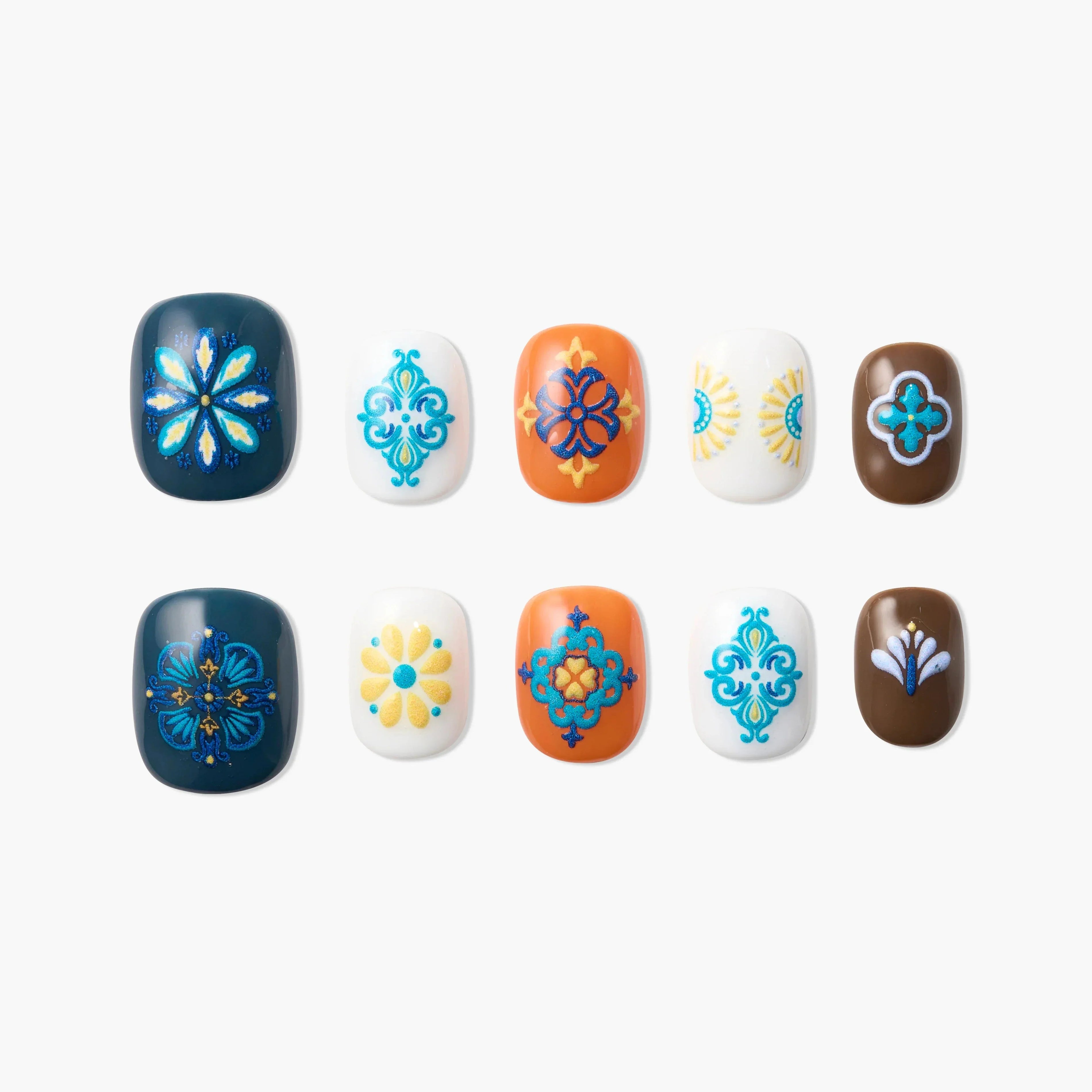 Handmade press-on nails with blue, orange, and white floral and geometric designs