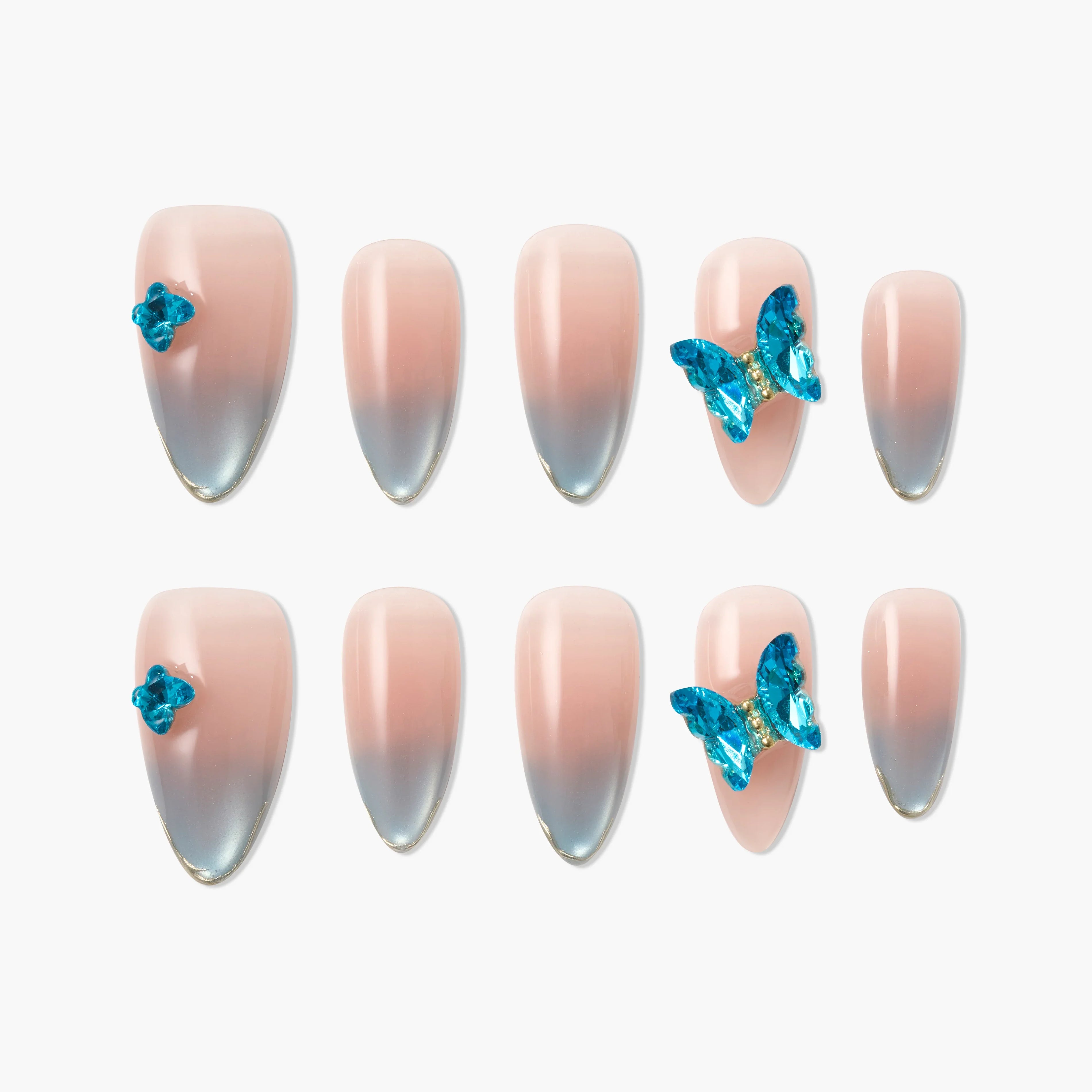 Handmade press-on nails with pink to blue ombre and 3D blue butterfly accents