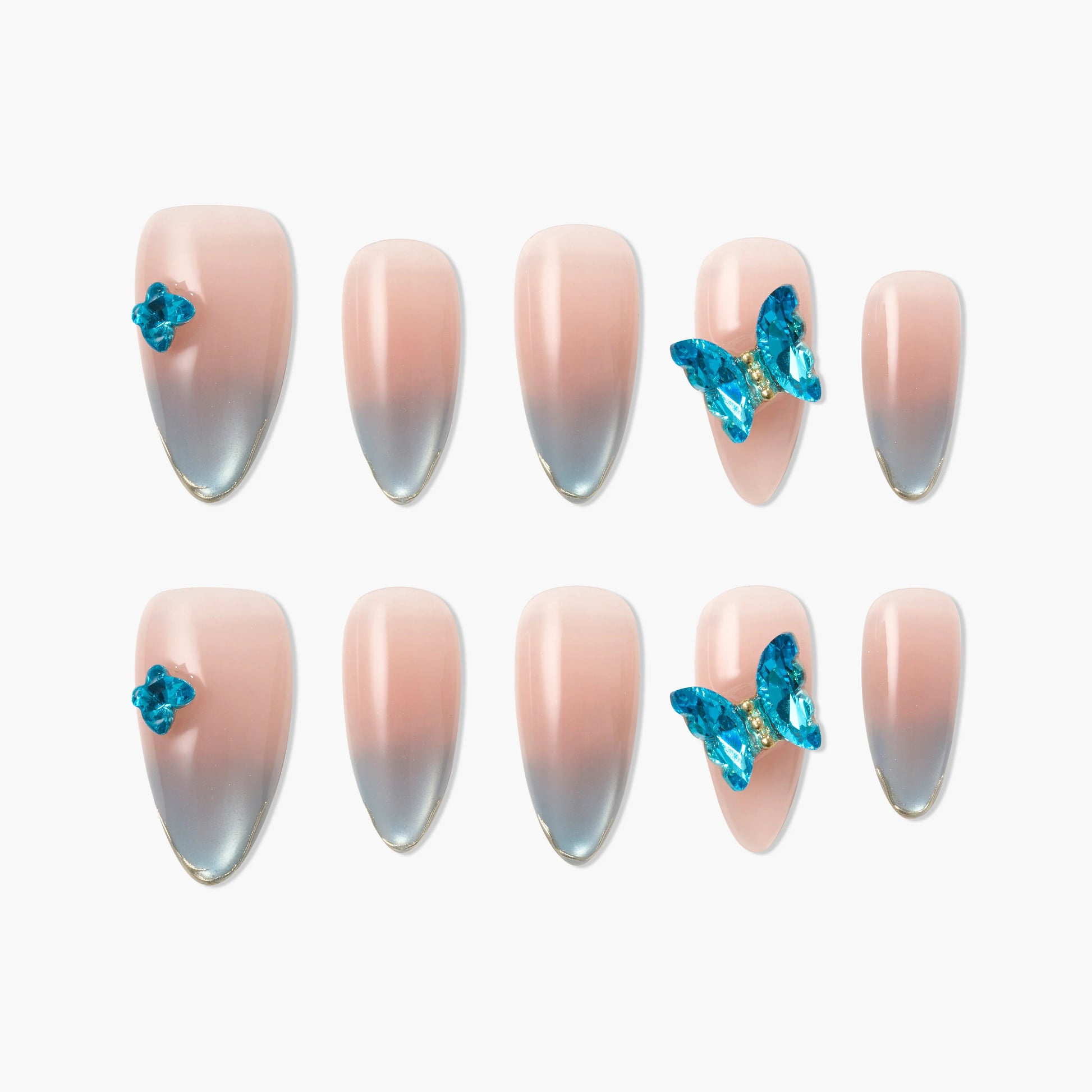 Handmade press-on nails with pink to blue ombre and 3D blue butterfly accents