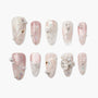 Handmade press-on nails in pink and pearl with 3D gem and iridescent accents