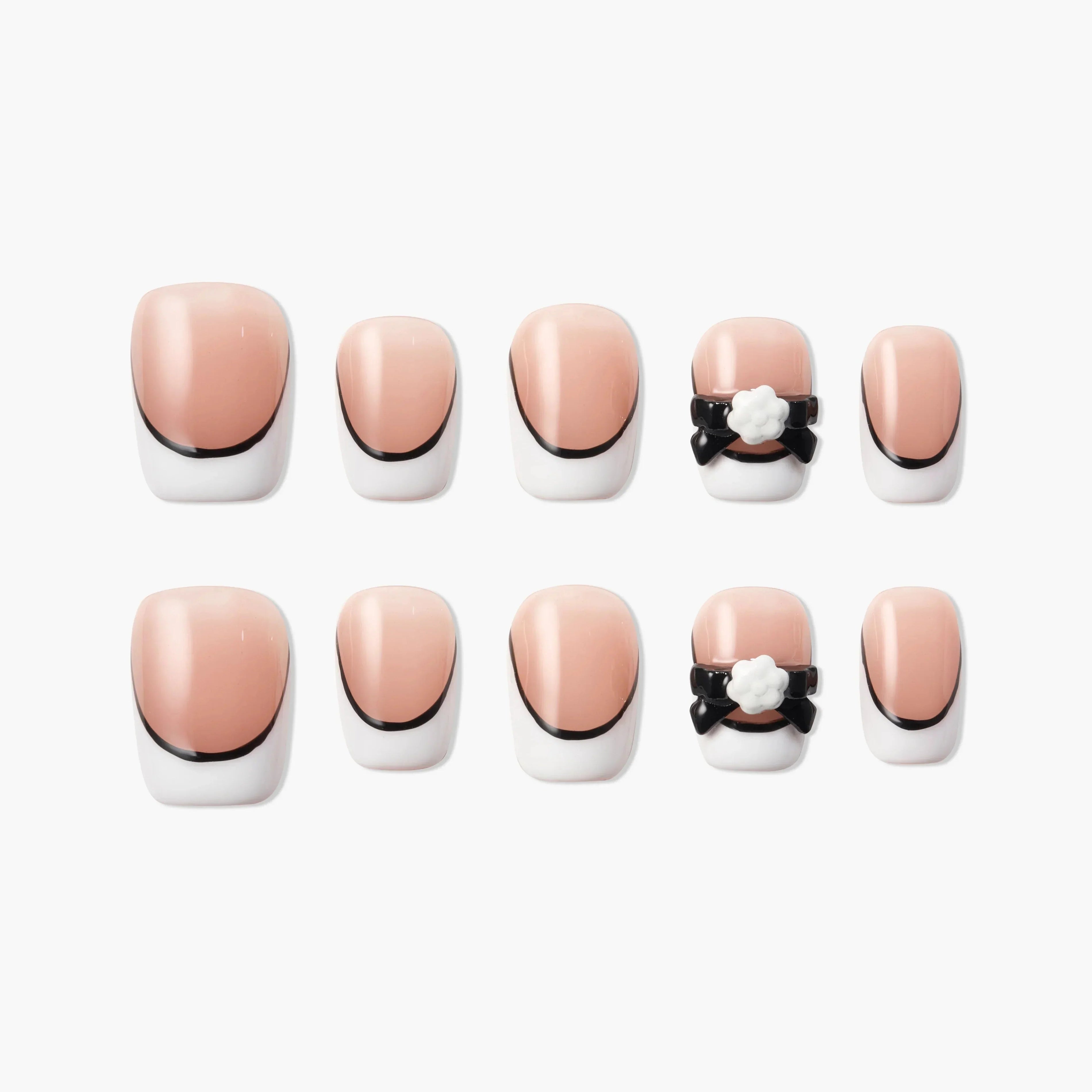 Handmade nude and white French tip press-on nails with black ribbon and 3D bow accents