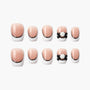 Handmade nude and white French tip press-on nails with black ribbon and 3D bow accents