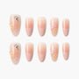 Handmade press-on nails with pink ombre, floral accents, and 3D flower designs