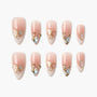 Set of pink ombre press-on nails with gold geometric accents and crystal gems
