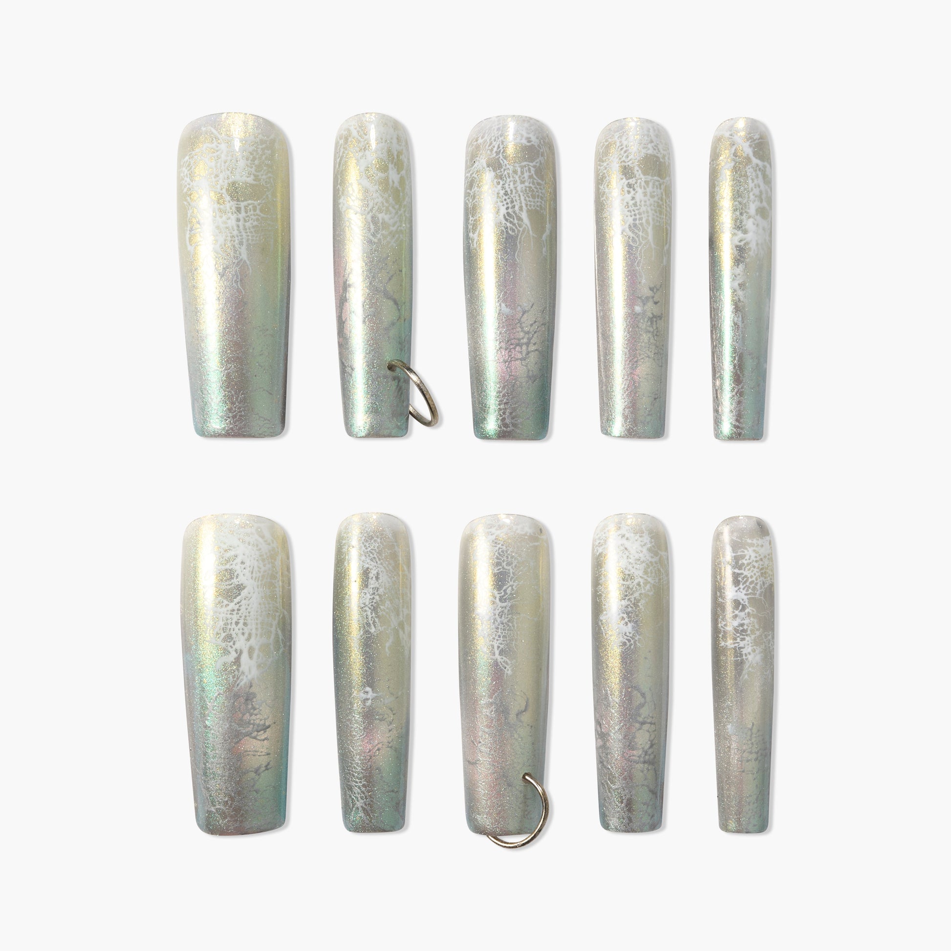 Iridescent coffin-shaped press-on nails with white marble and two accent rings