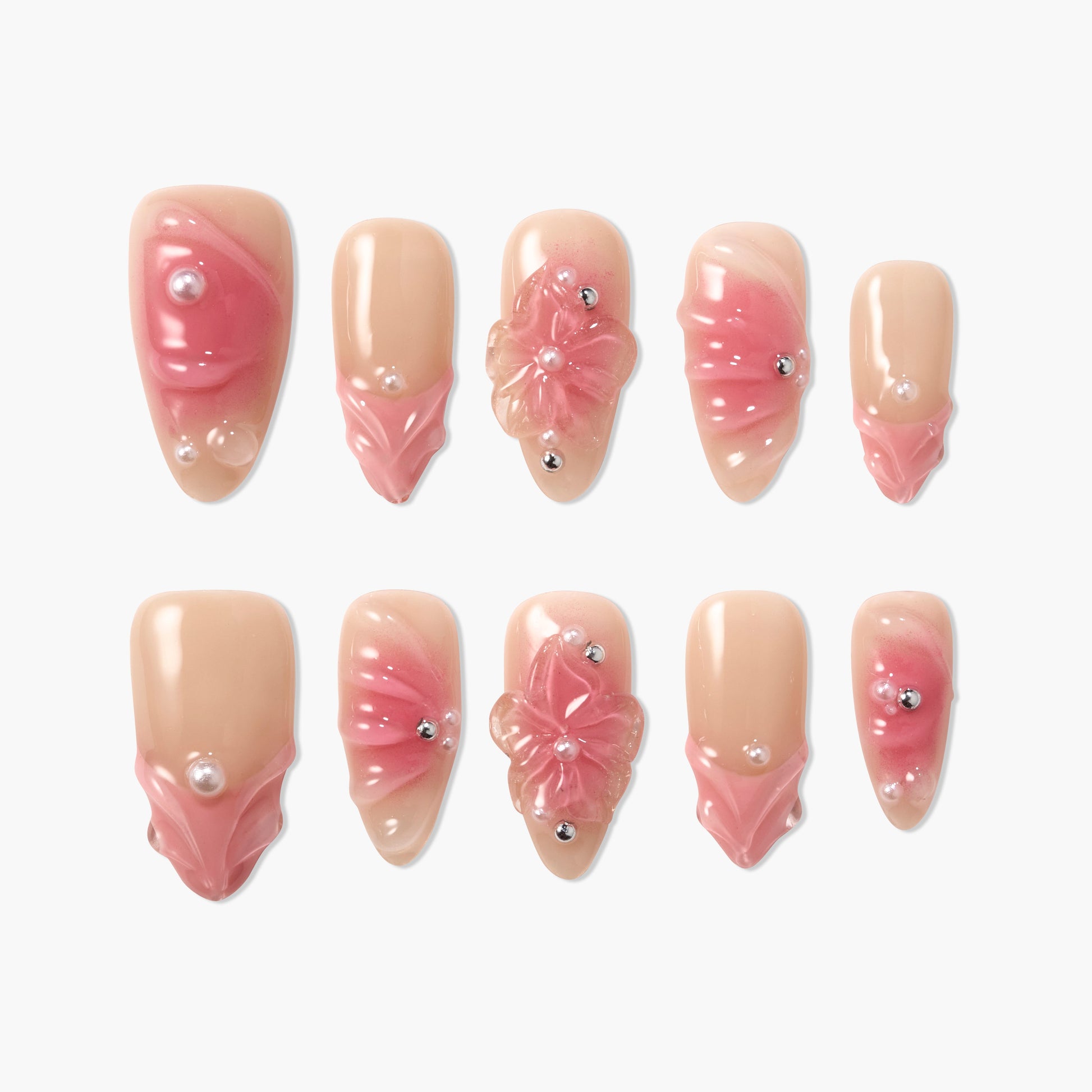 Handmade press-on nails with pink floral 3D designs, pearls, and rhinestone accents
