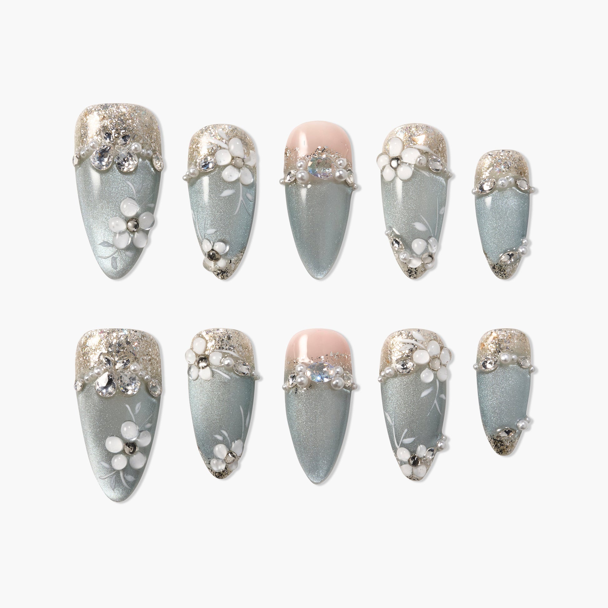 Handmade press-on nails with metallic light blue base, 3D floral designs, rhinestones, and glitter tips.