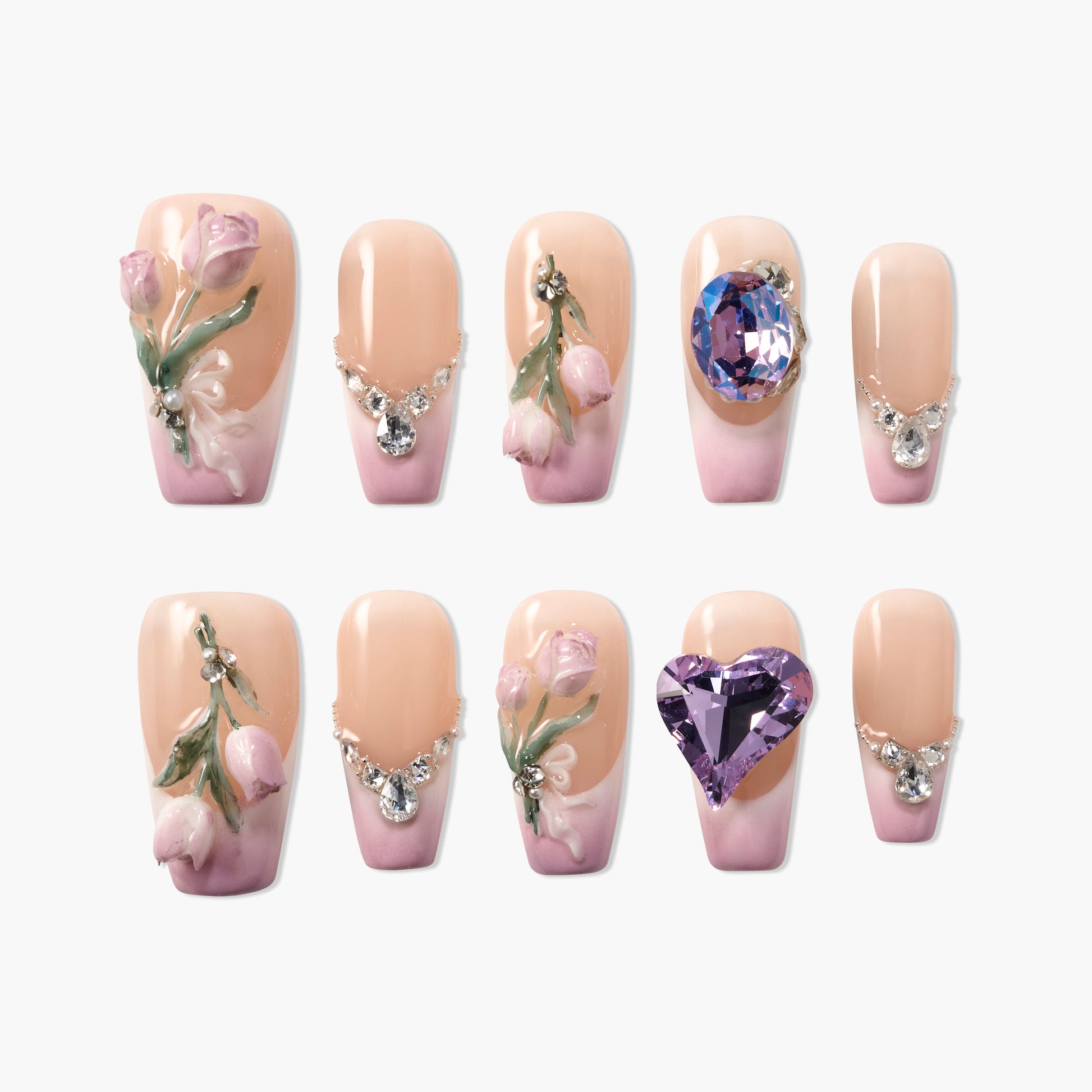 Handmade press-on nails with pink ombré, 3D rose designs, and crystal gem accents.