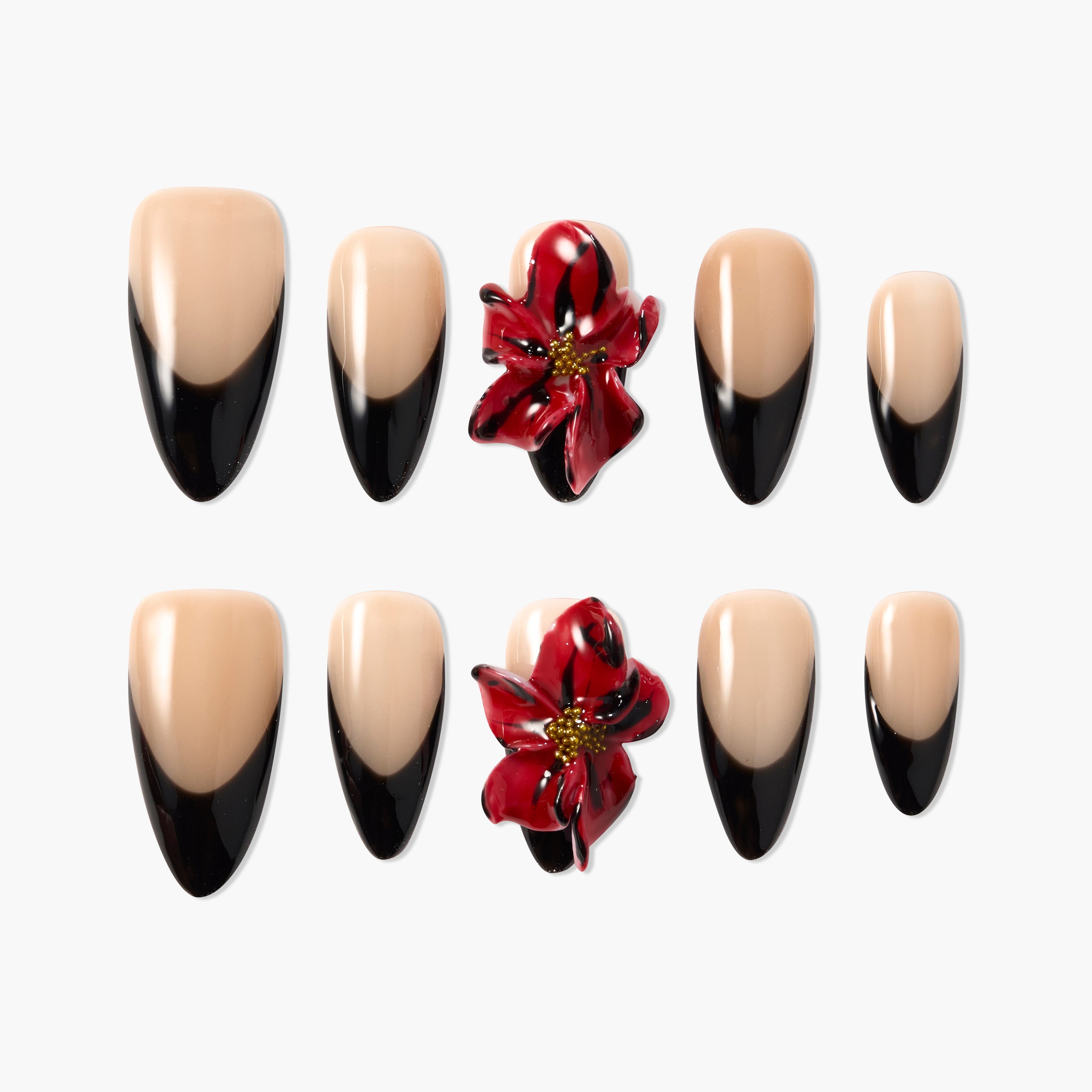 Coffin-shaped press-on nails with black French tips and 3D red floral accent designs