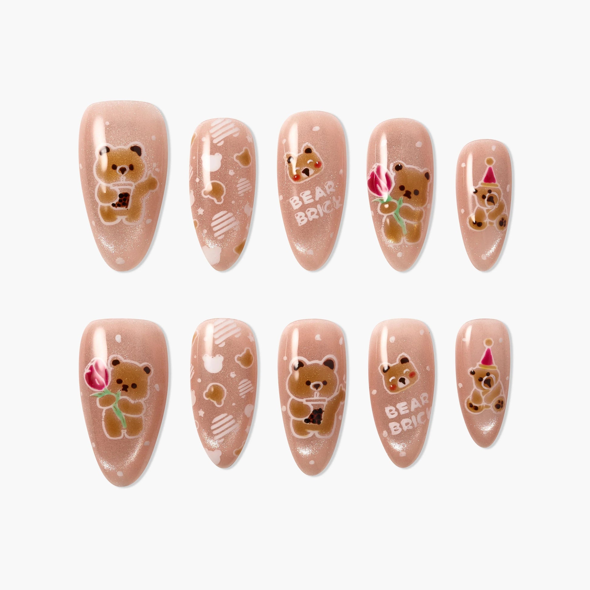 Cute bear-themed press-on nails with pink base, cartoon bear art, and playful accents.
