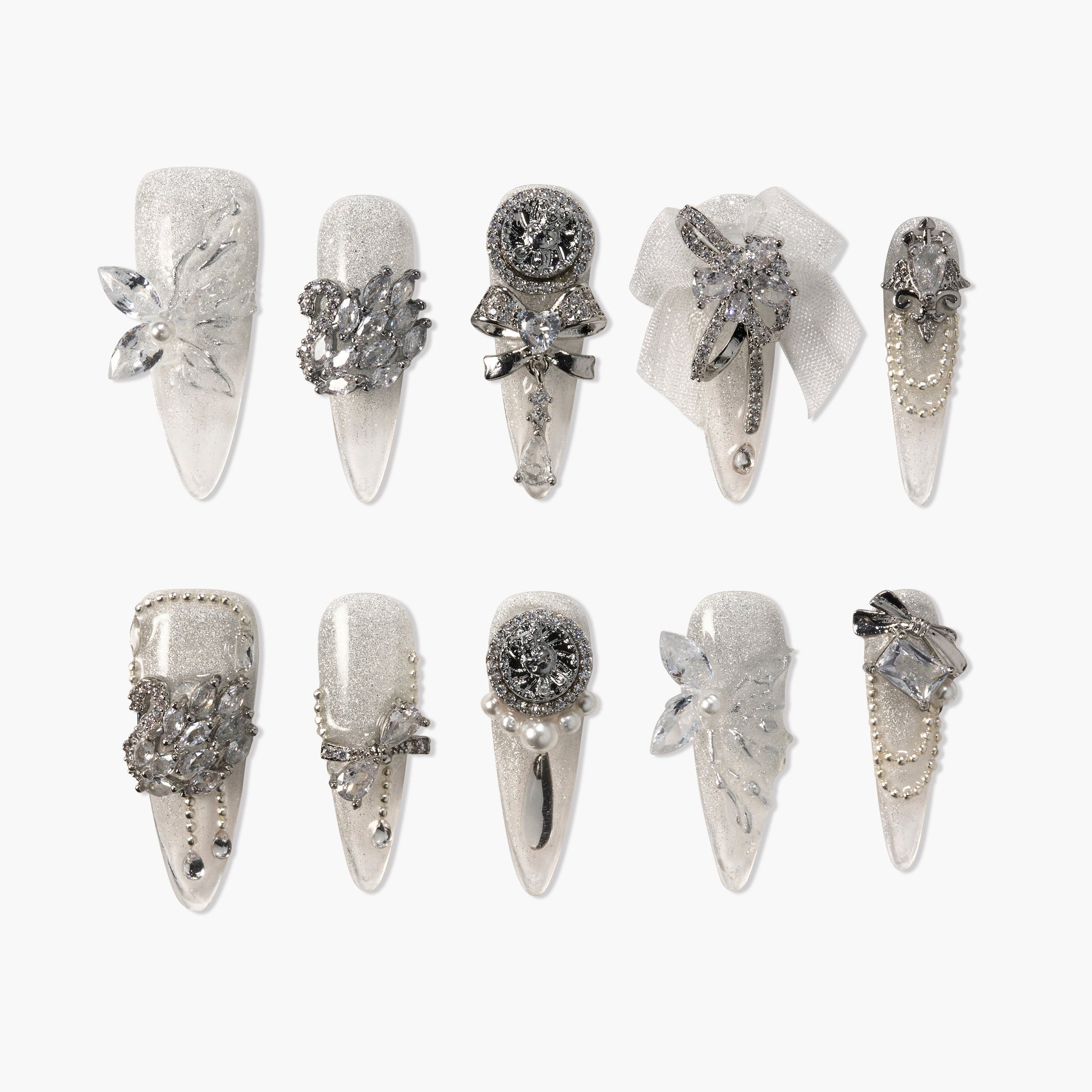 Silver glitter press-on nails with 3D rhinestones, pearls, bows, and floral accents