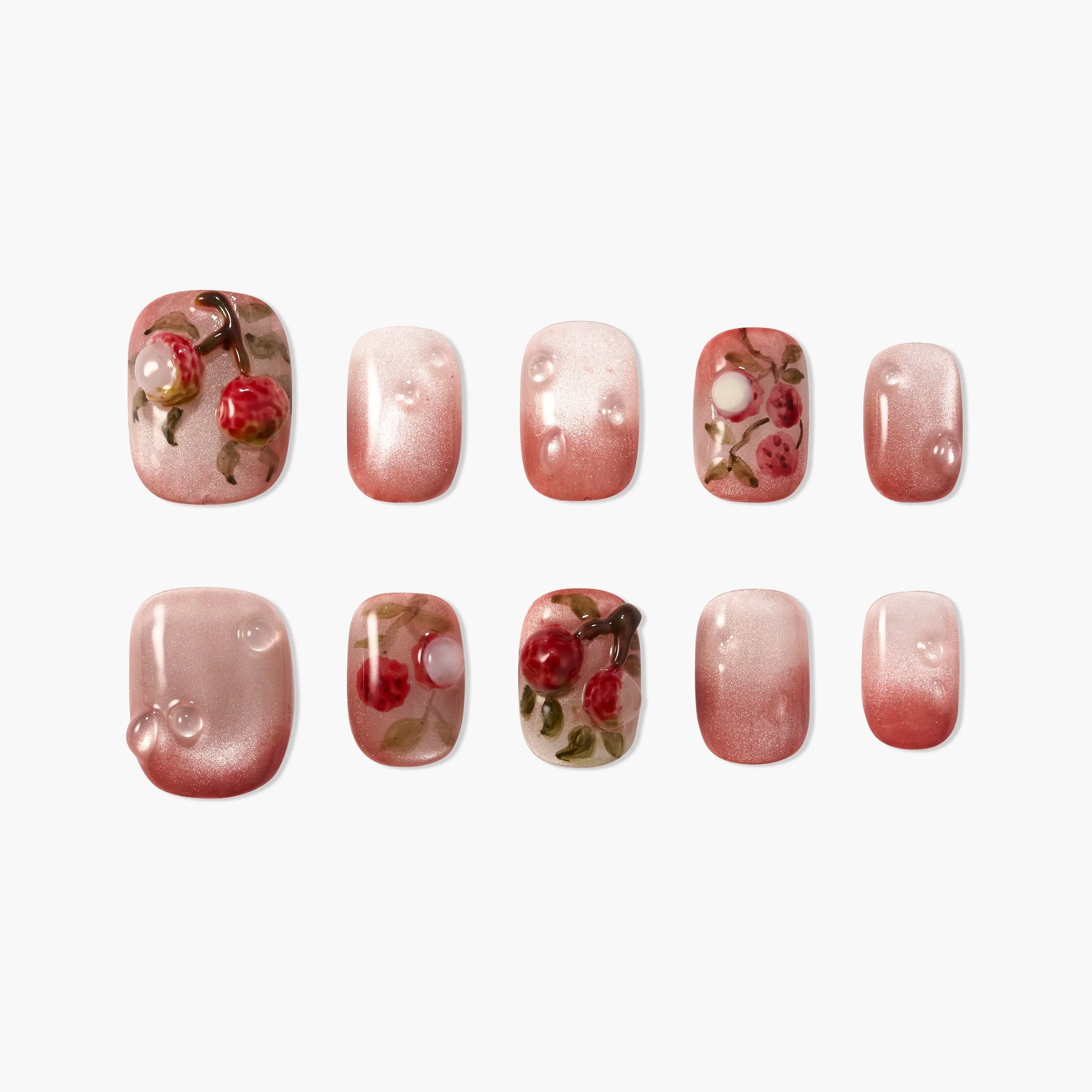 Handmade press-on nails with pink ombre, 3D cherry and floral designs, glossy finish