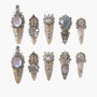 Handmade press-on nails set with pearl, opal, and rhinestone embellishments on a nude base