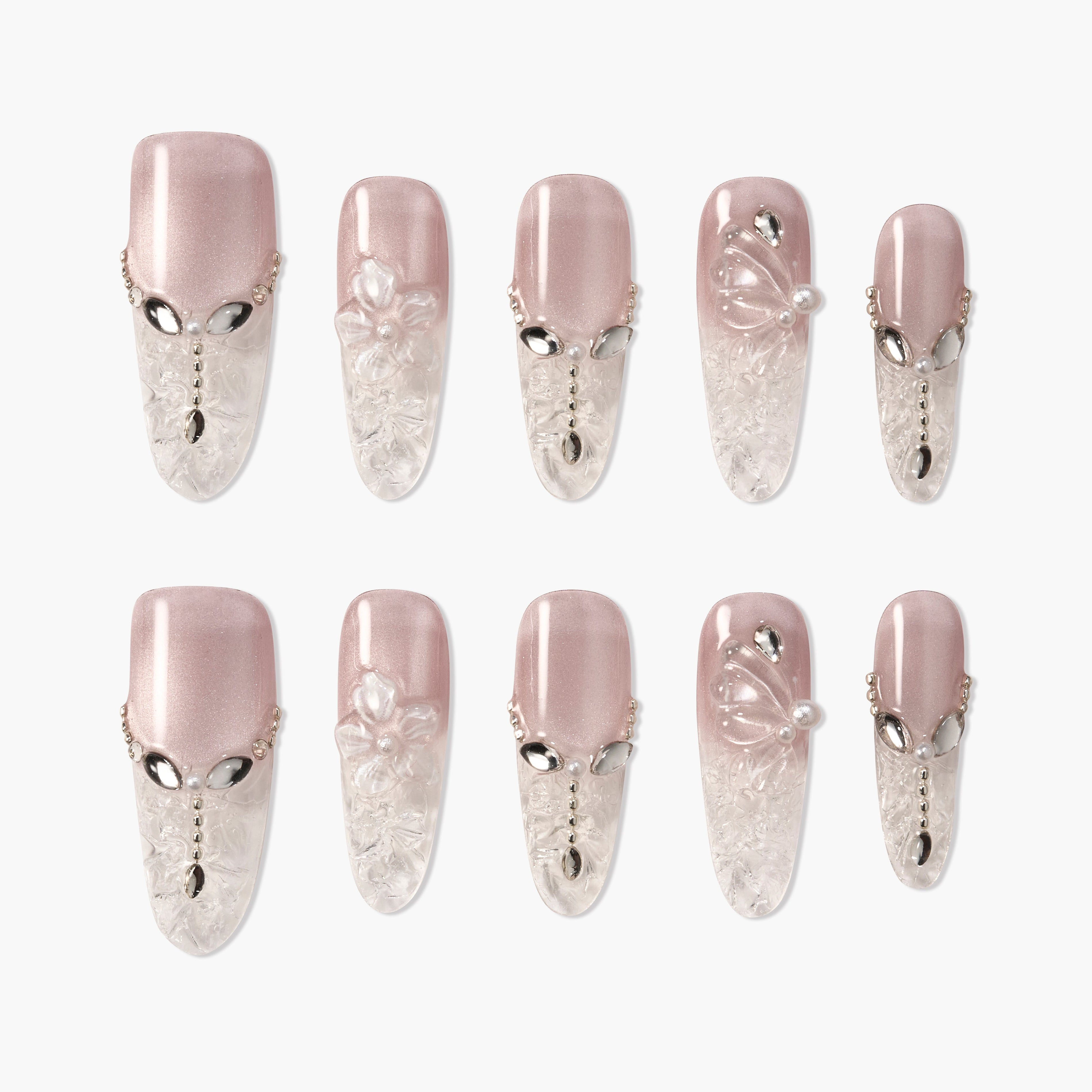 Handmade press-on nails with pink and clear ombre, 3D floral art, rhinestones, and pearls