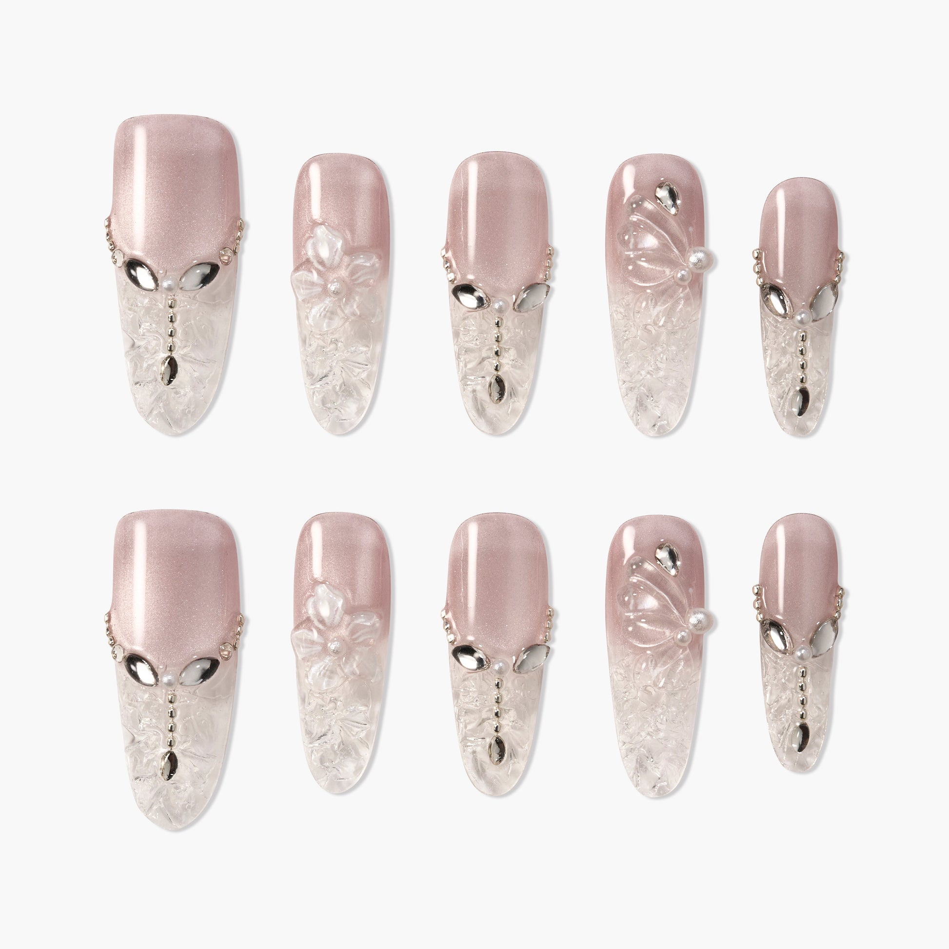 Handmade press-on nails with pink and clear ombre, 3D floral art, rhinestones, and pearls