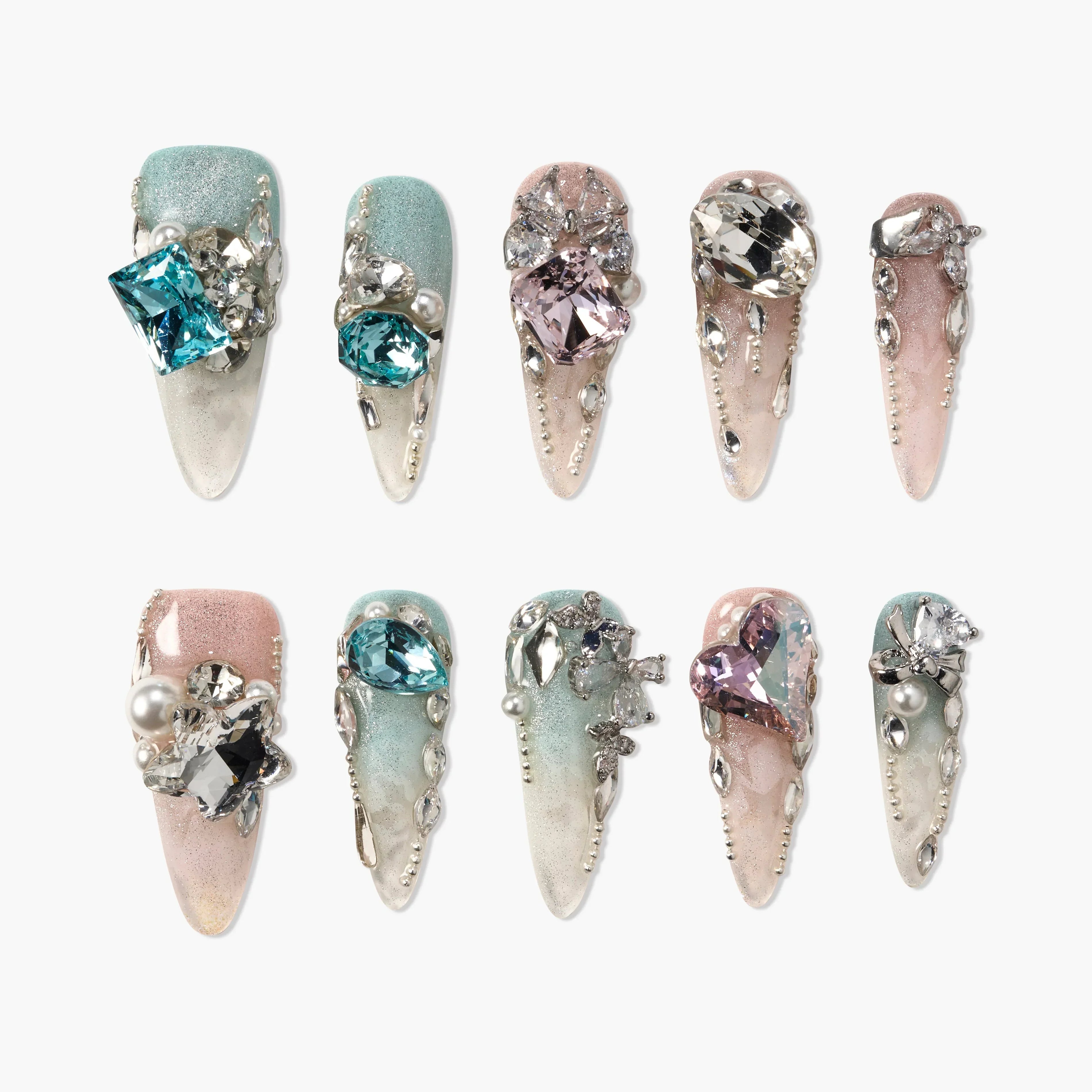 Handmade press-on nails with pastel gradients, jeweled crystals, and pearl accents