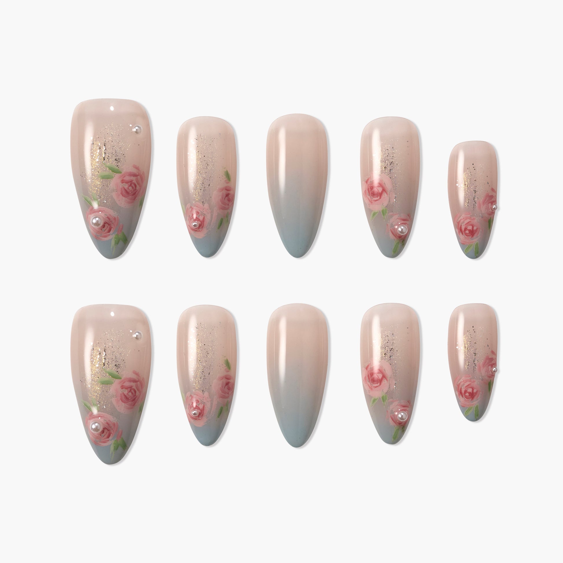 Handmade press-on nails with pink rose floral designs, pearls, and nude blue gradient tips