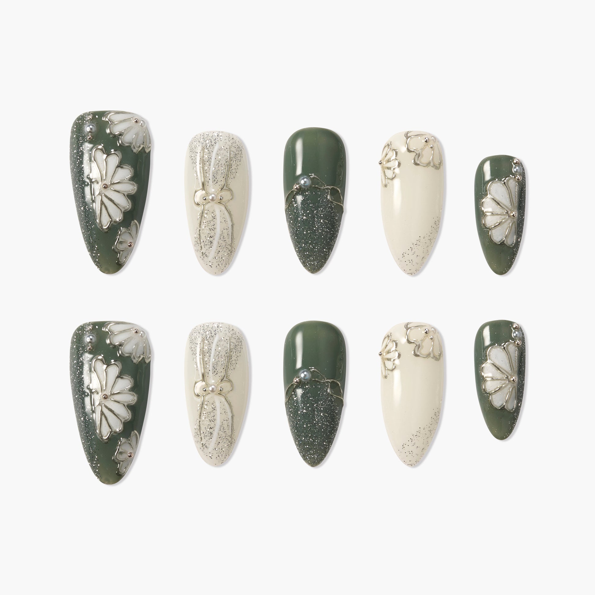 Handmade press-on nails in green and cream with daisy floral and glitter accents