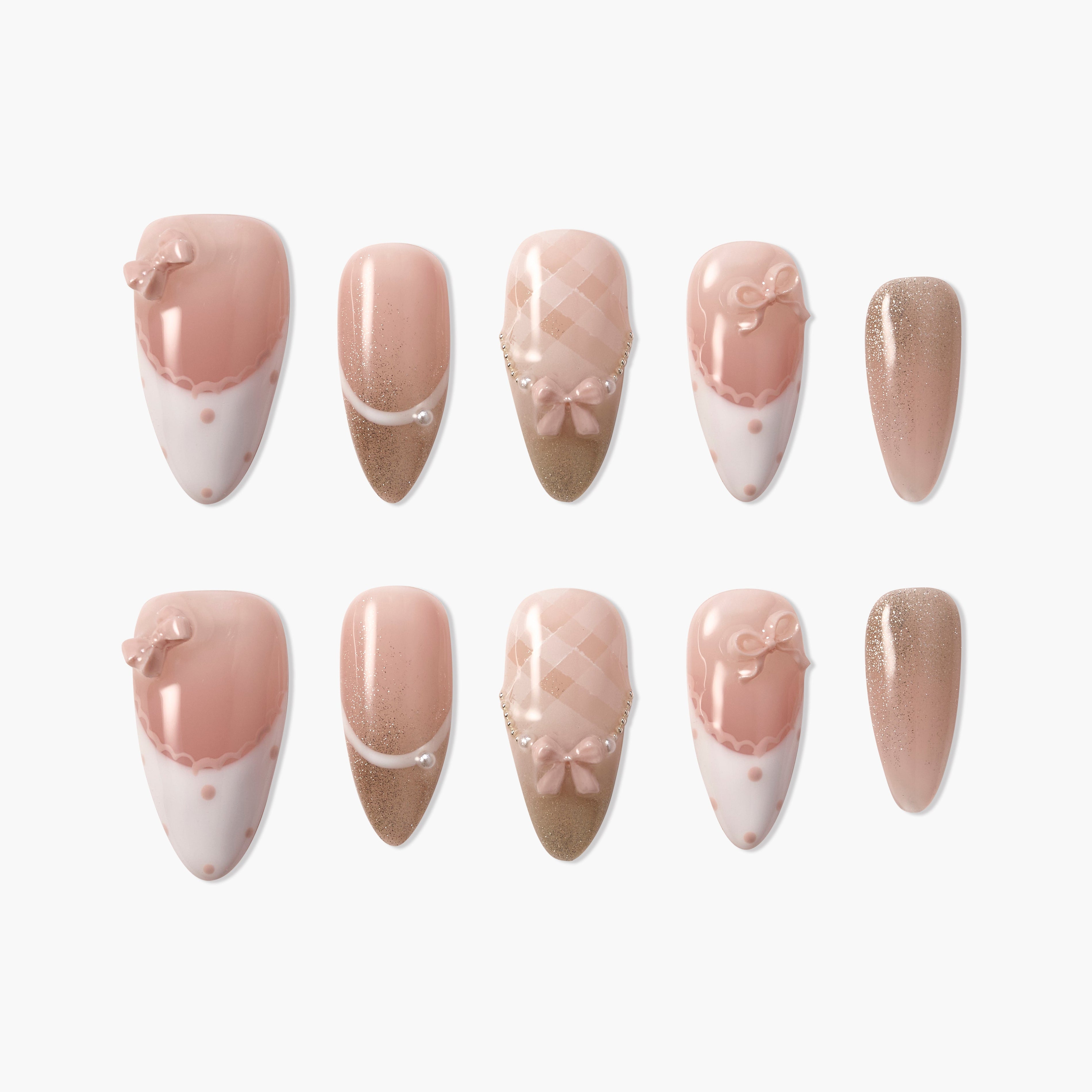 Handmade pink press-on nails with bows, pearls, glitter, and plaid designs, set of ten.