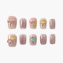Set of handmade press-on nails with pastel mushroom designs and sparkly pink accents