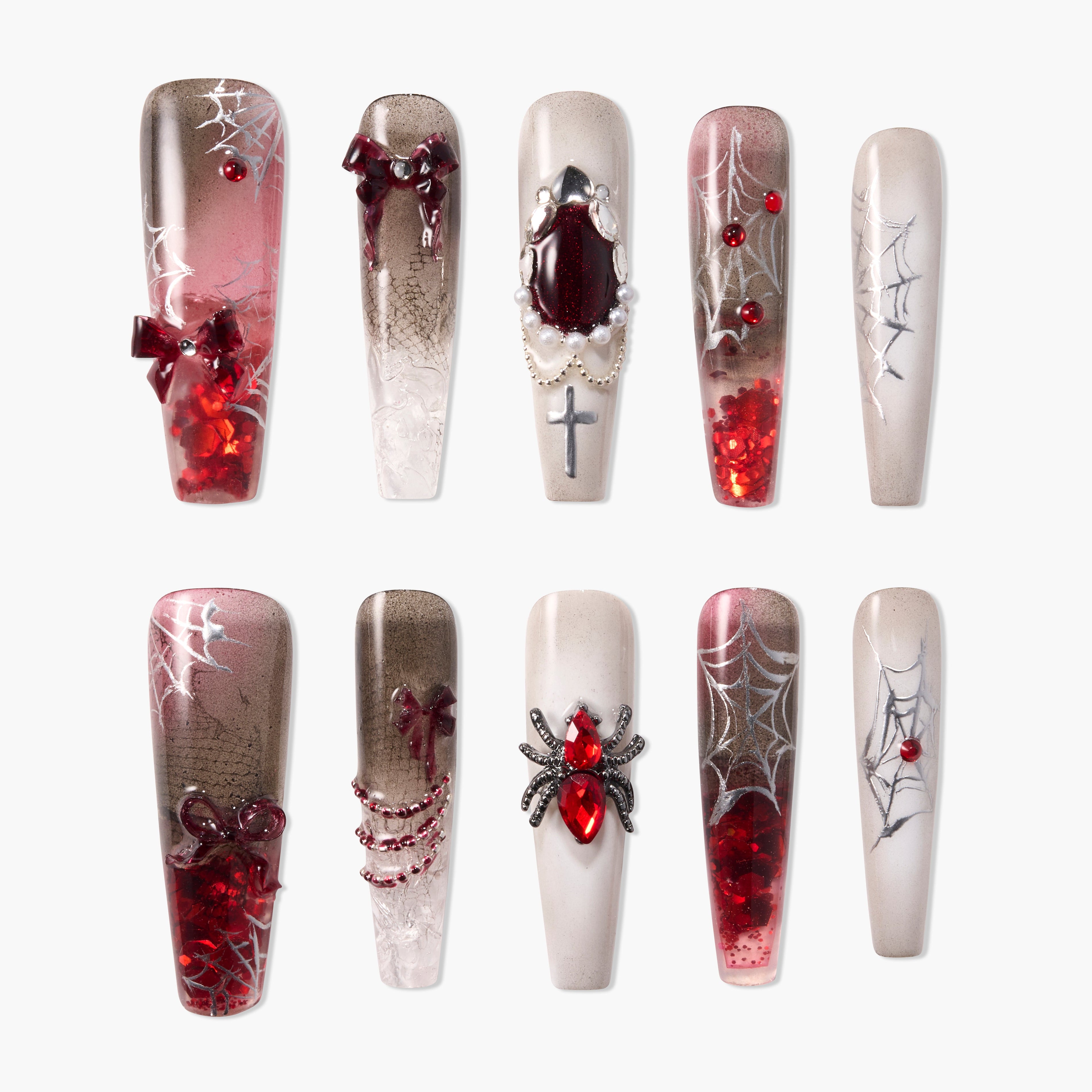 Handmade press-on nails with red gems, spider and web designs, gothic themed nail art