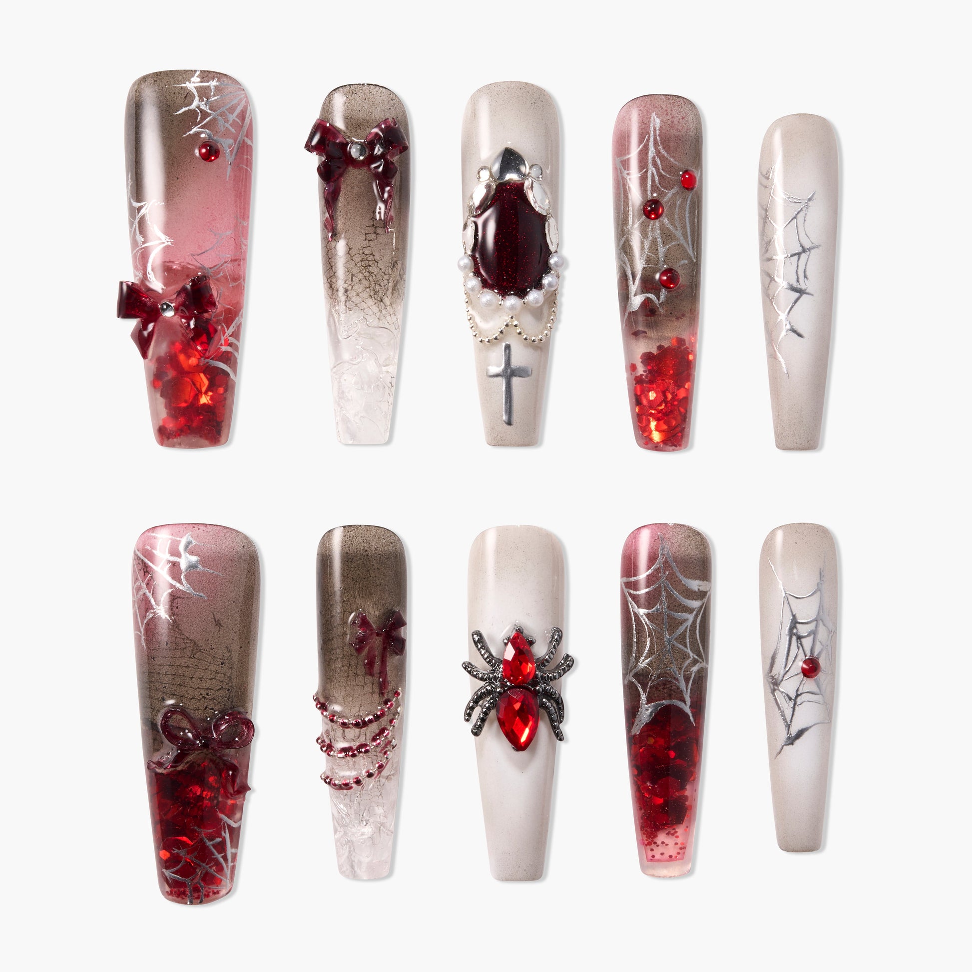 Handmade press-on nails with red gems, spider and web designs, gothic themed nail art