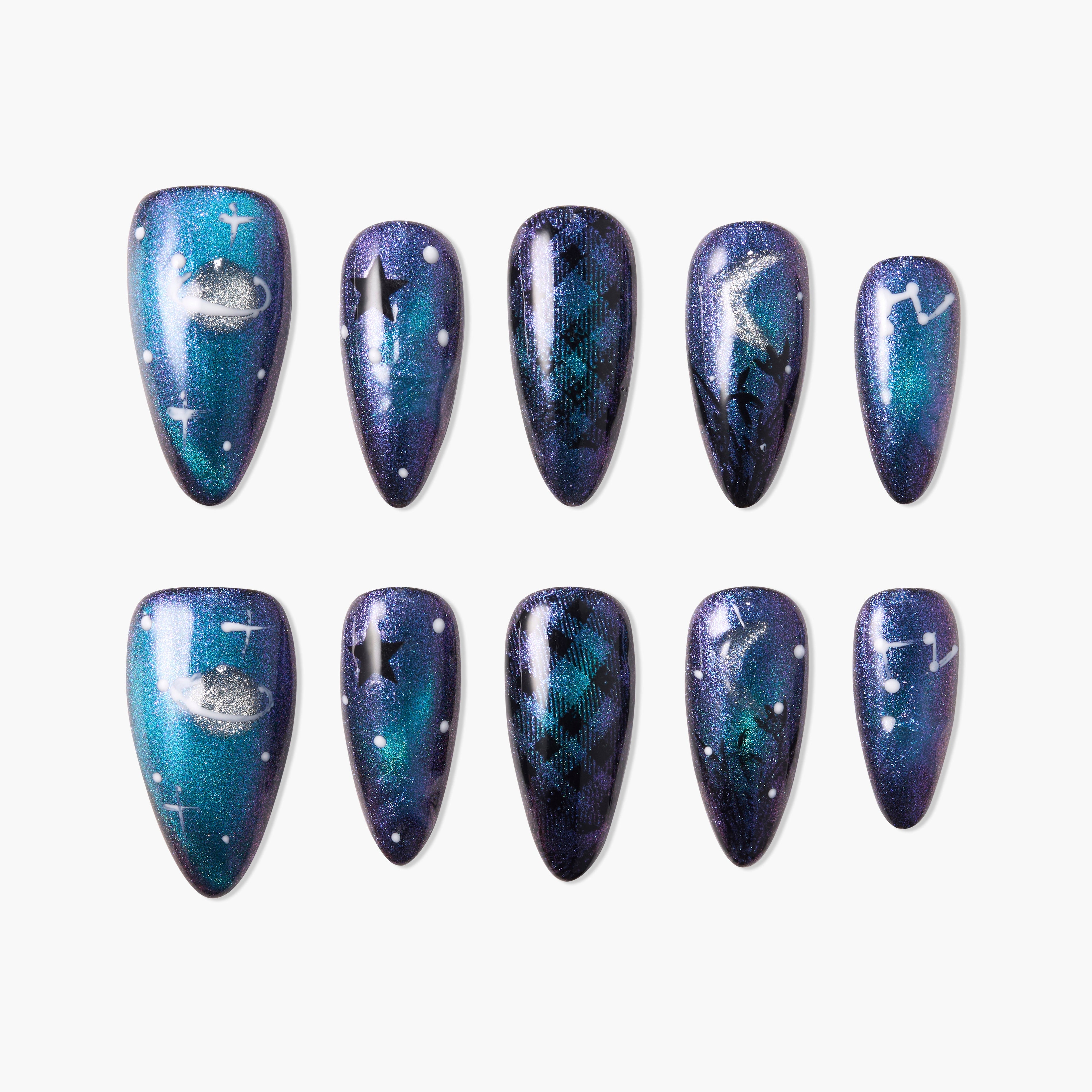 Galaxy-themed press-on nails with planets, stars, constellations, and plaid designs