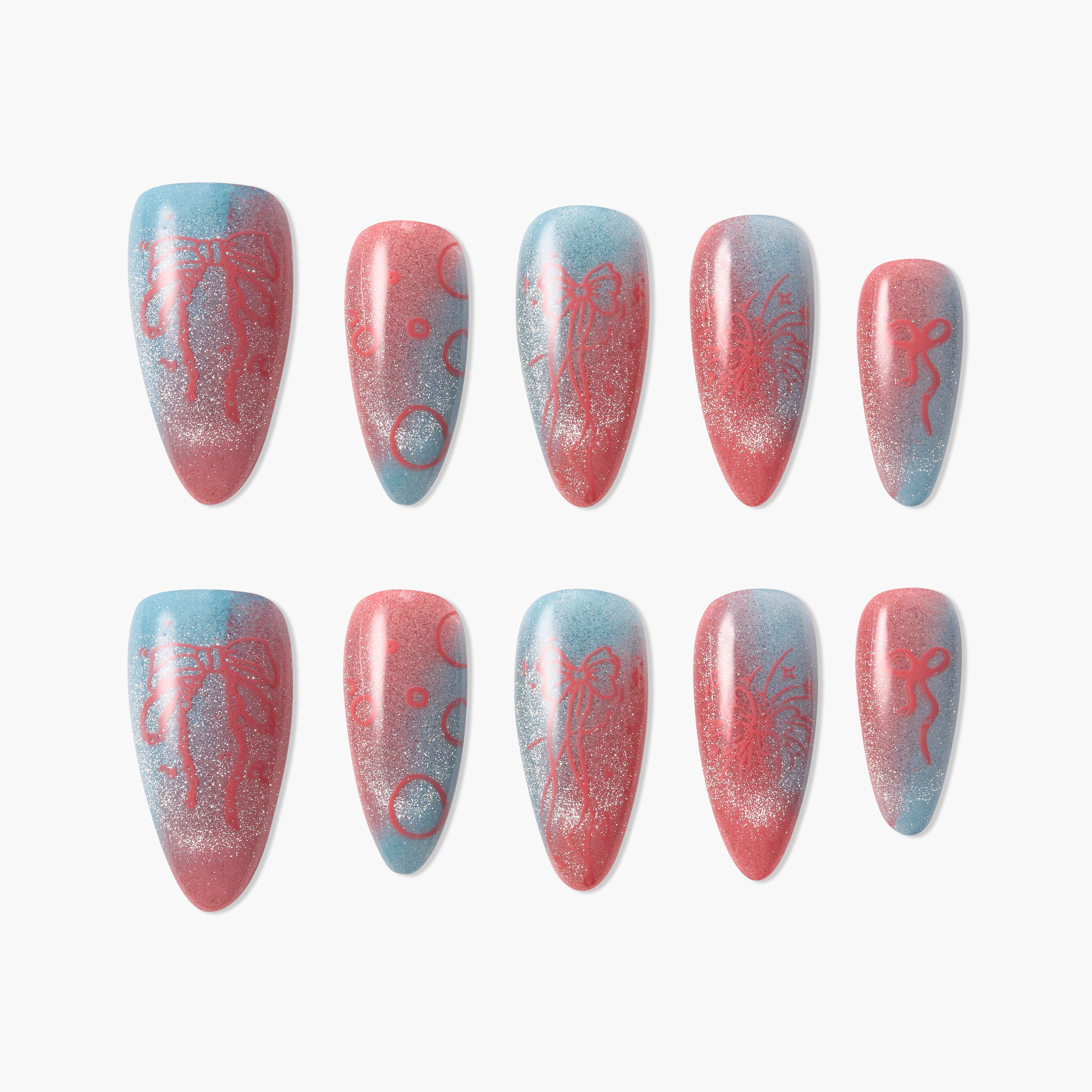 Handmade press-on nails with blue and pink gradient, bow and circle designs, glitter accents