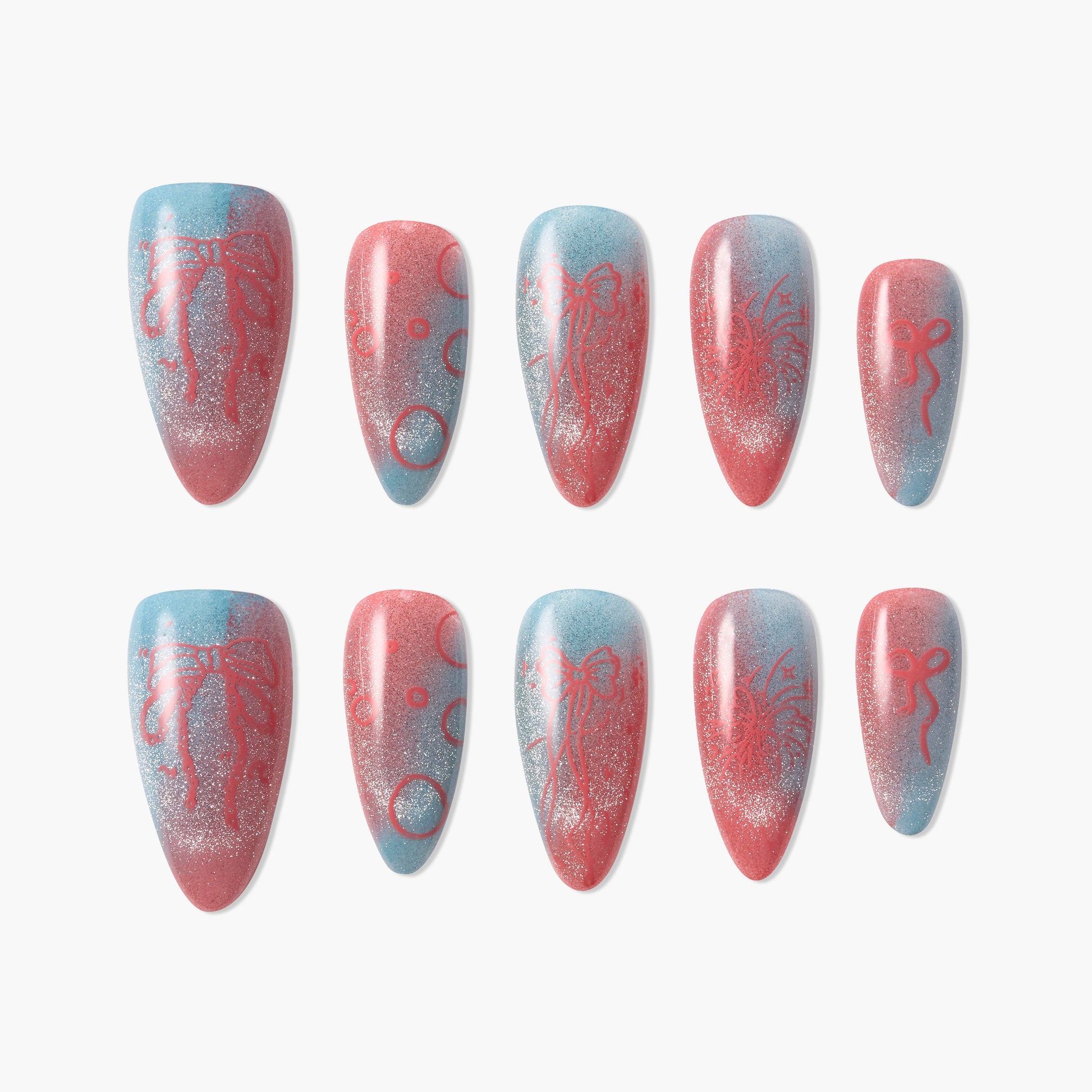 Handmade press-on nails with blue and pink gradient, bow and circle designs, glitter accents