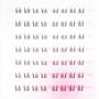 Tray of individual lash extensions arranged in neat rows on a white and pink background