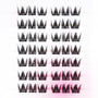 Tray of black wispy cat-eye false eyelash clusters on white background