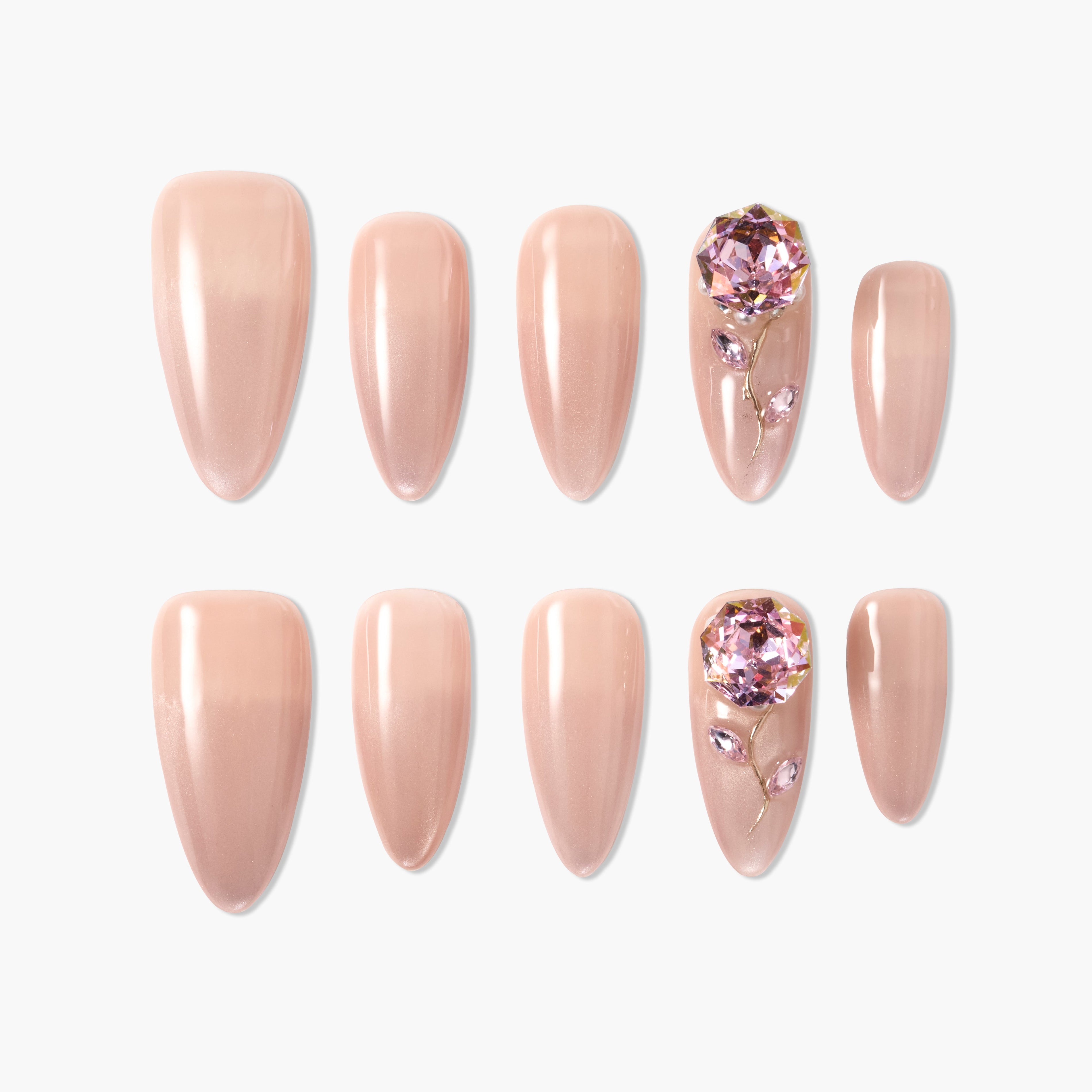 Handmade press-on nails in nude pink with crystal flower rhinestone accents