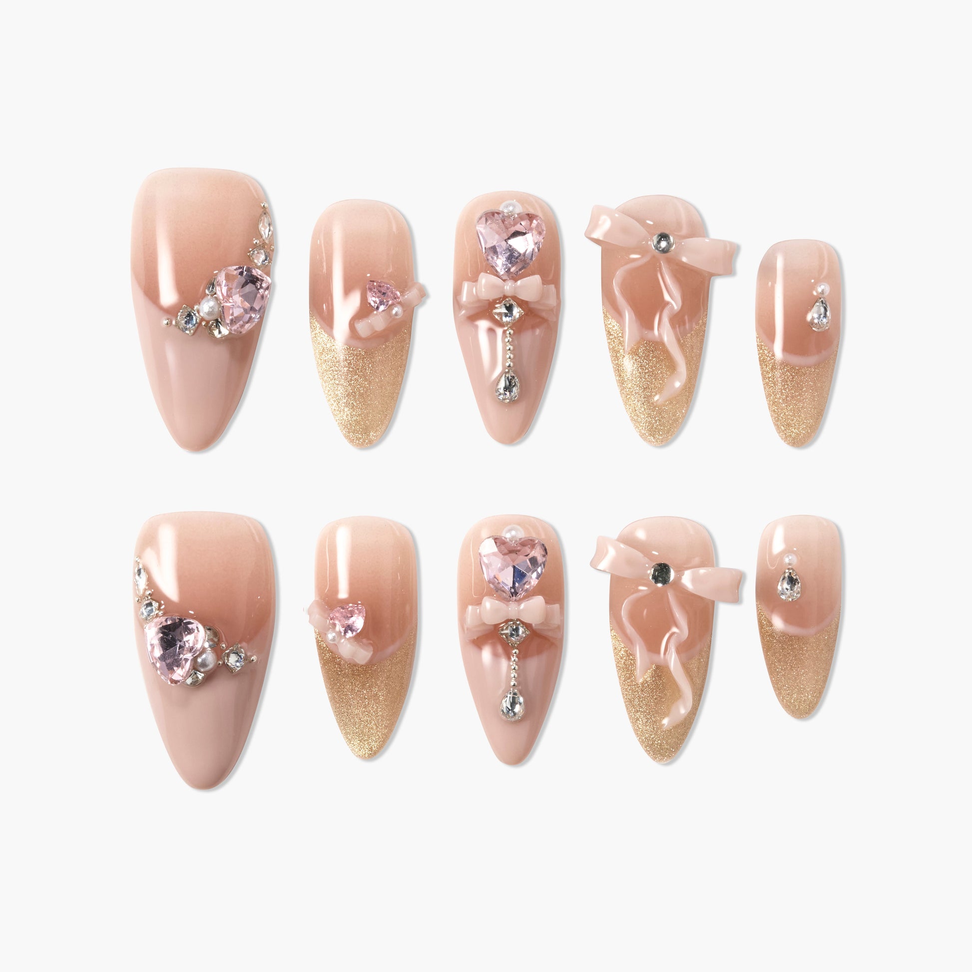 Glitter ombre pink press-on nails with 3D bows, hearts, and rhinestone accents