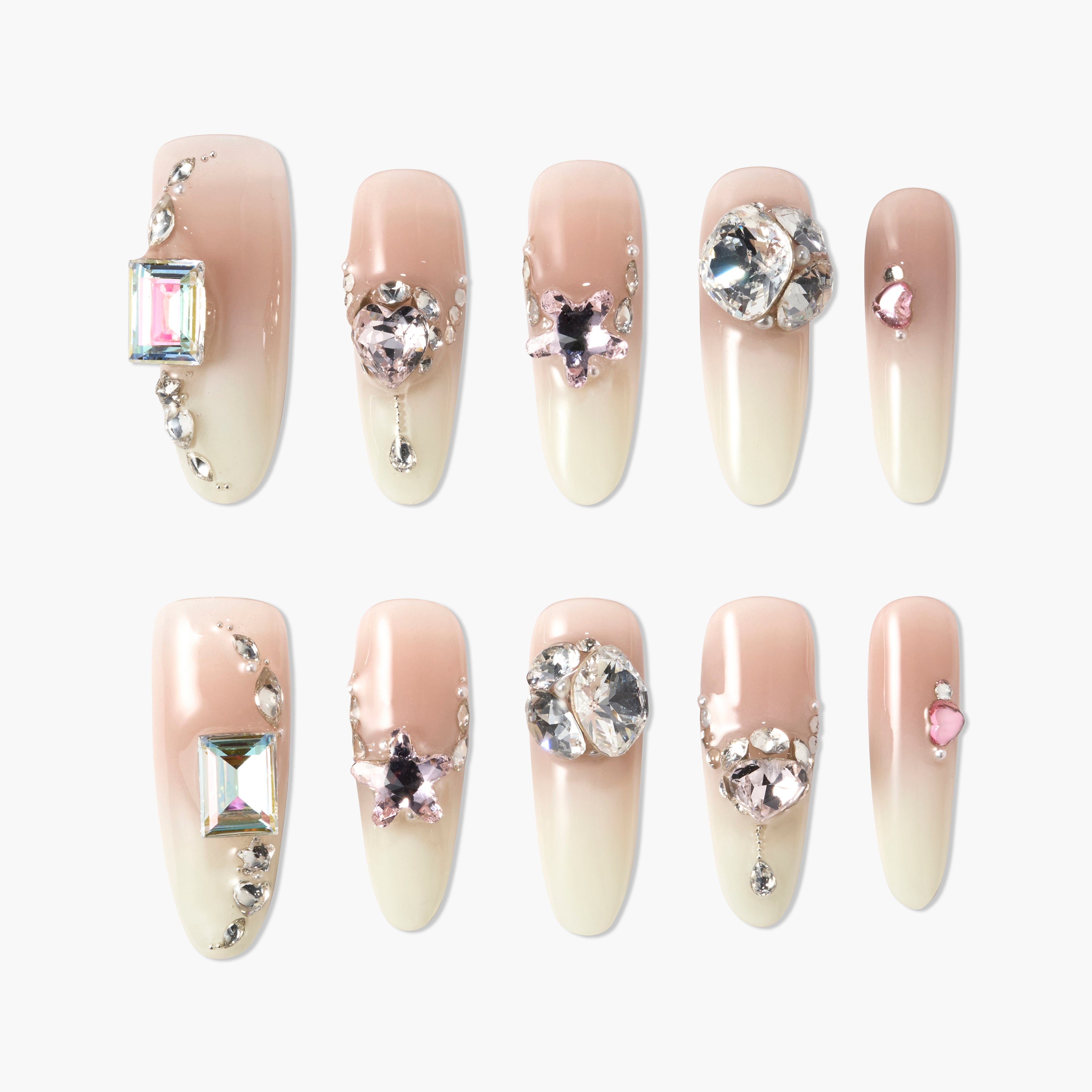 Handmade press-on nails with nude ombre base and 3D gemstone rhinestone accents