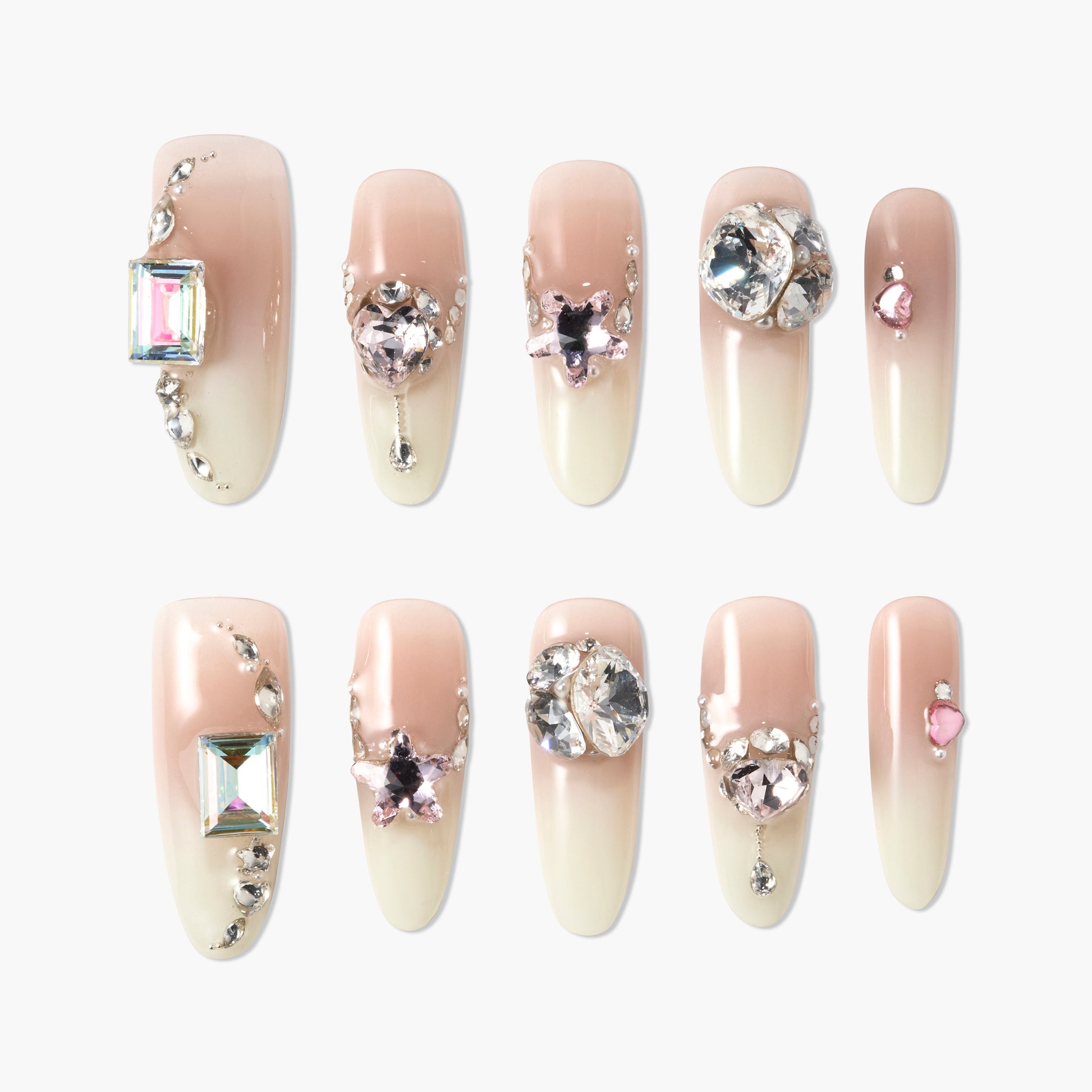 Handmade press-on nails with nude ombre base and 3D gemstone rhinestone accents