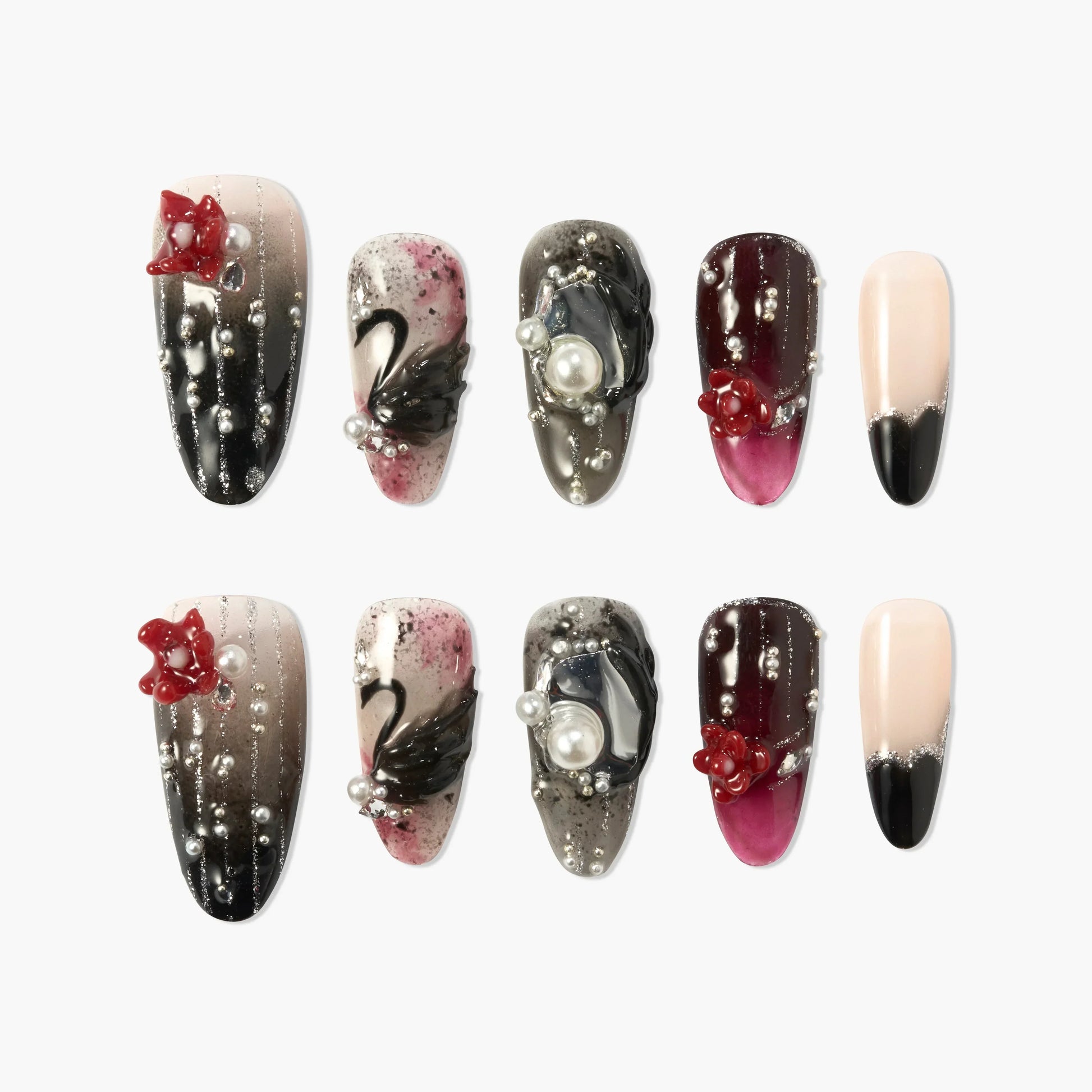 Handmade press-on nails with black, pink, and nude designs, 3D pearls, swans, and red floral accents.