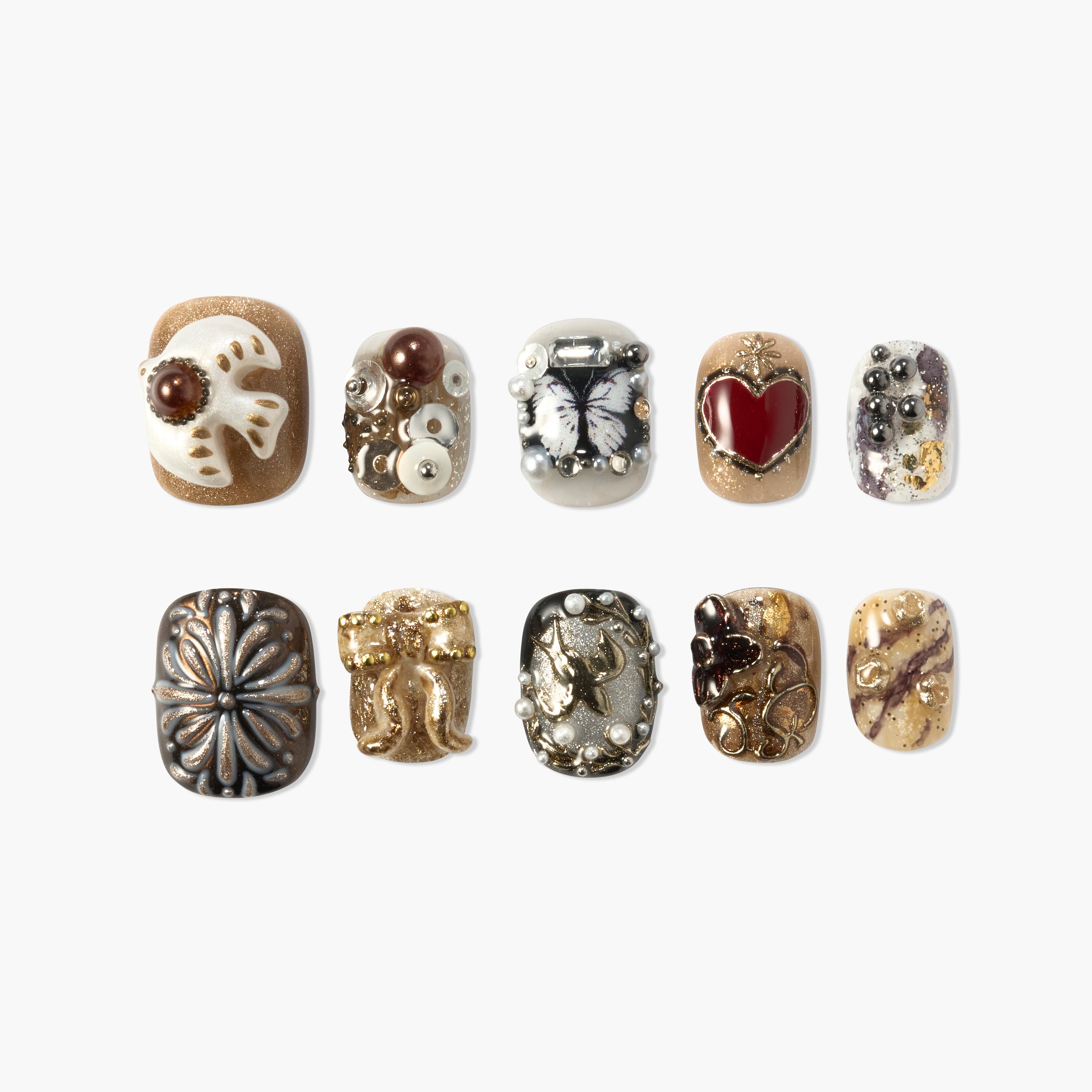 Handmade press-on nails with brown, gold, and pearl 3D designs and embellishments