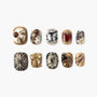 Handmade press-on nails with brown, gold, and pearl 3D designs and embellishments