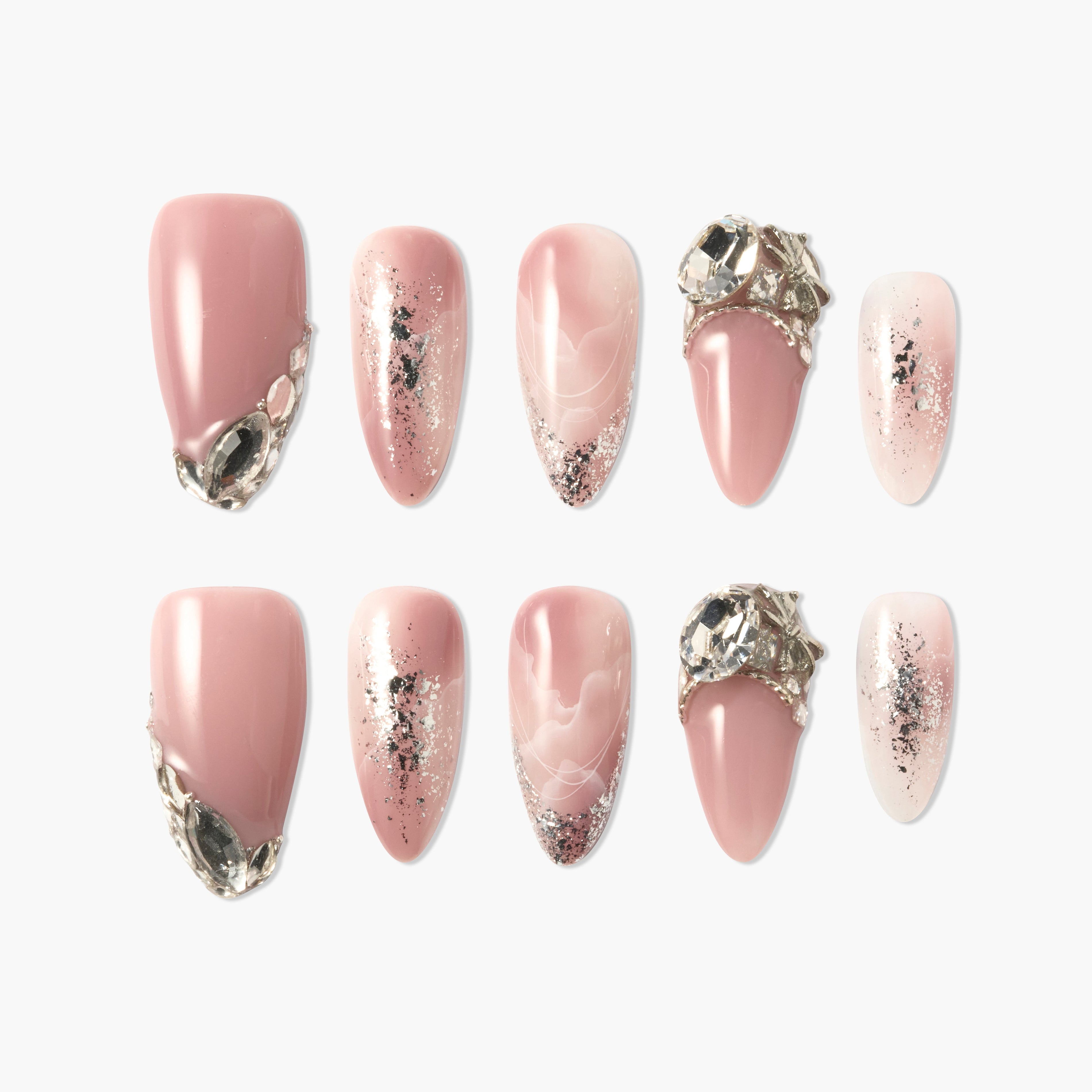 Handmade pink press-on nails with silver glitter and large gemstone embellishments