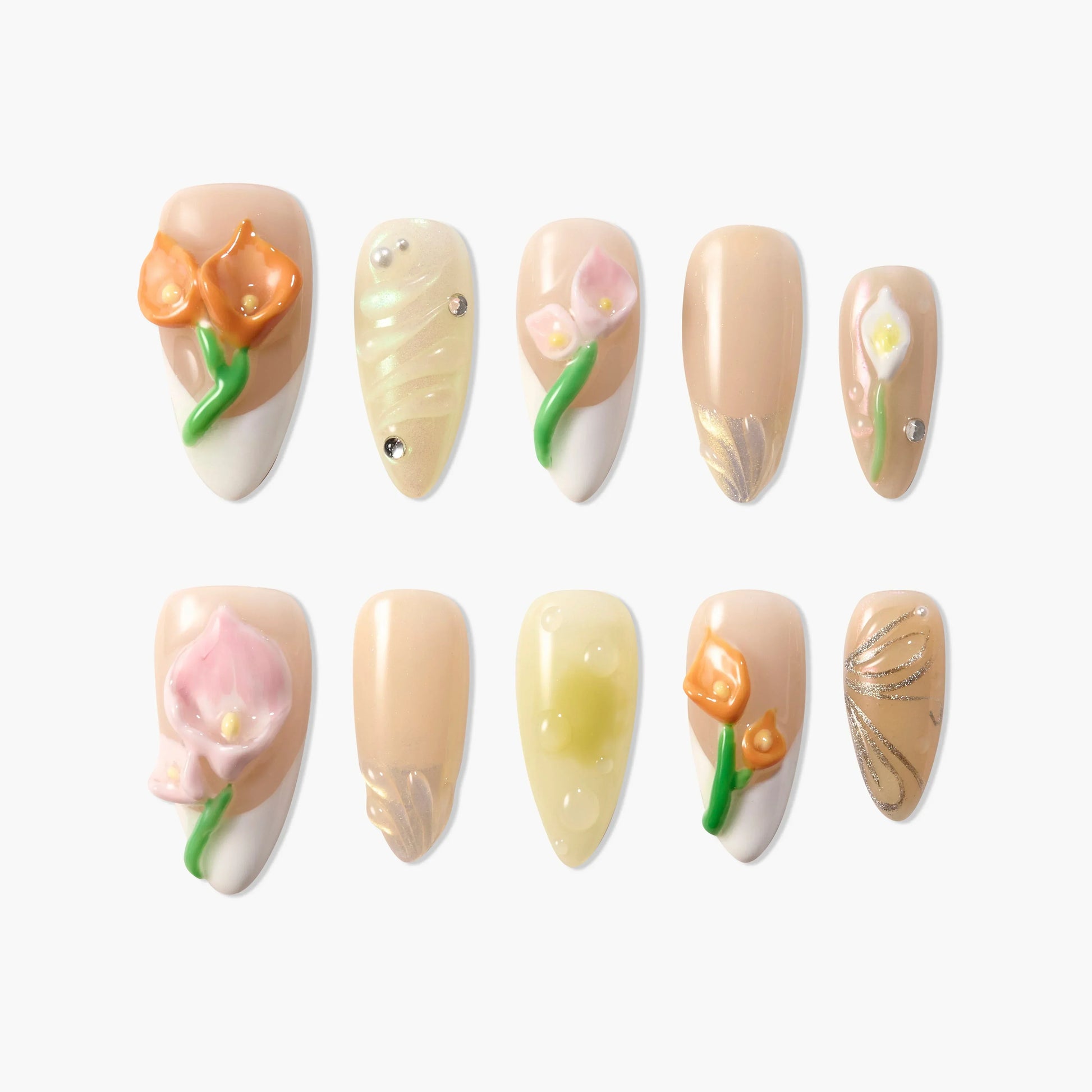 Handmade press-on nails with 3D floral designs and nude tones, featuring glossy and glitter accents
