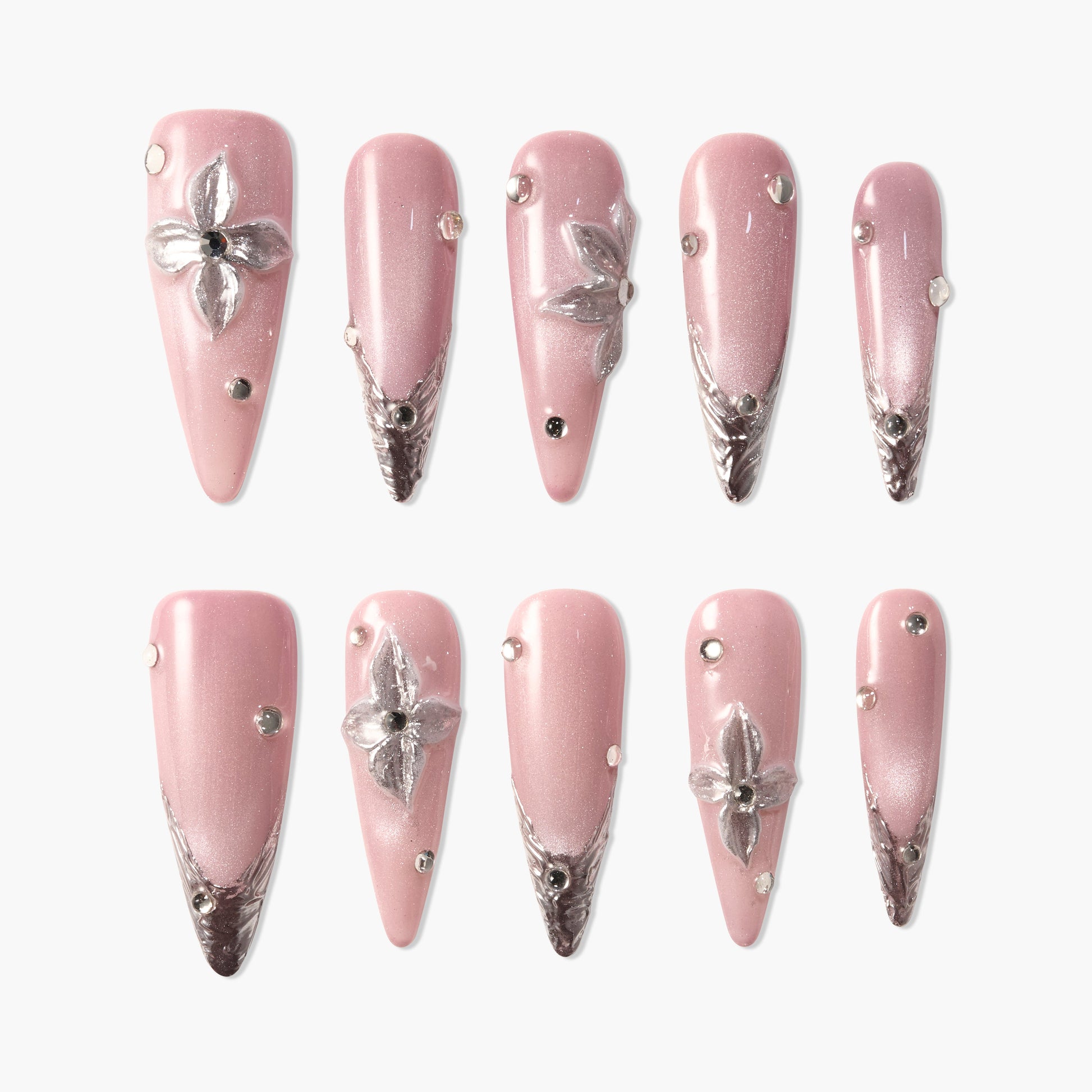 Pink press-on nails with silver floral 3D design and rhinestone accents, glossy finish