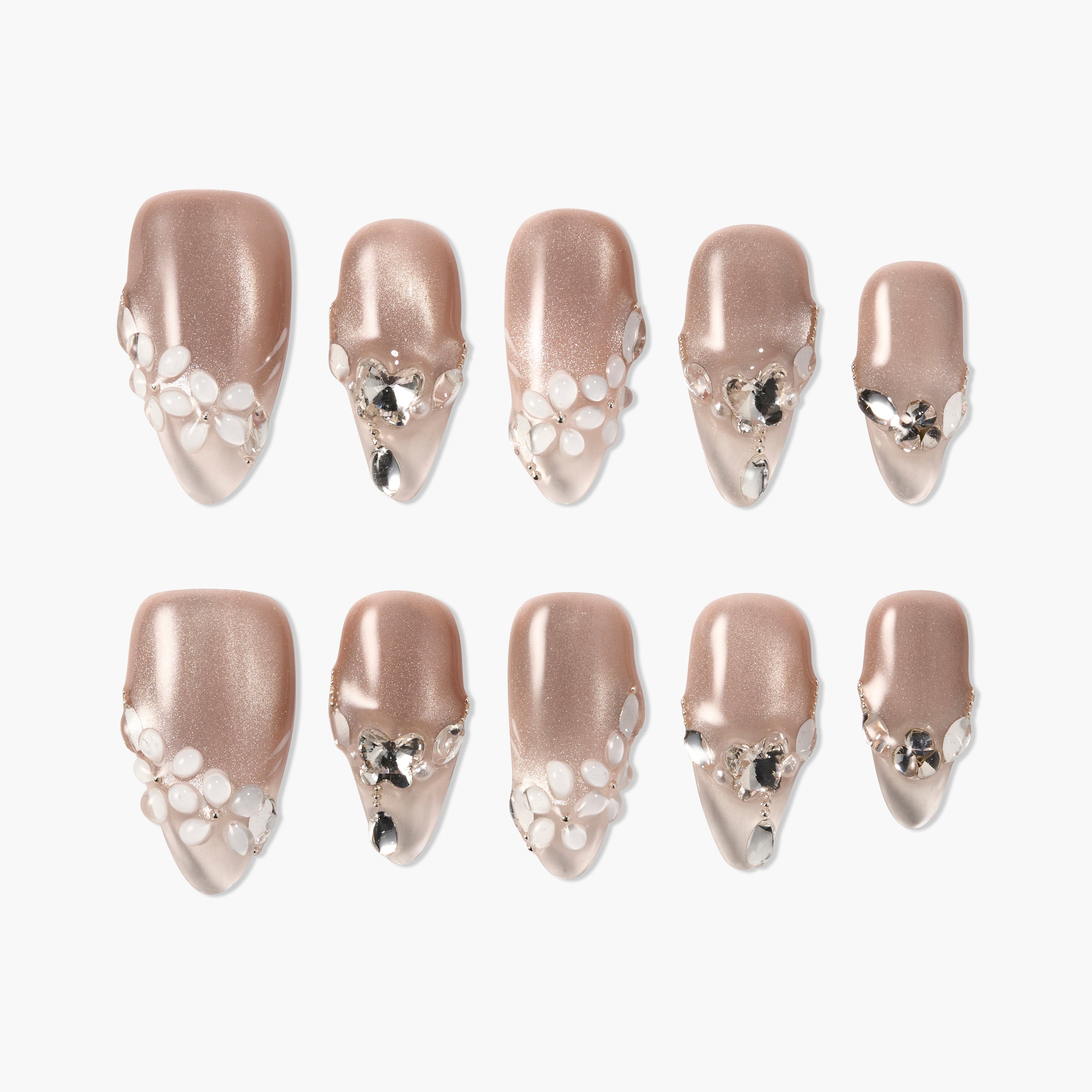 Set of nude shimmer press-on nails with white and silver 3D floral and gem designs.