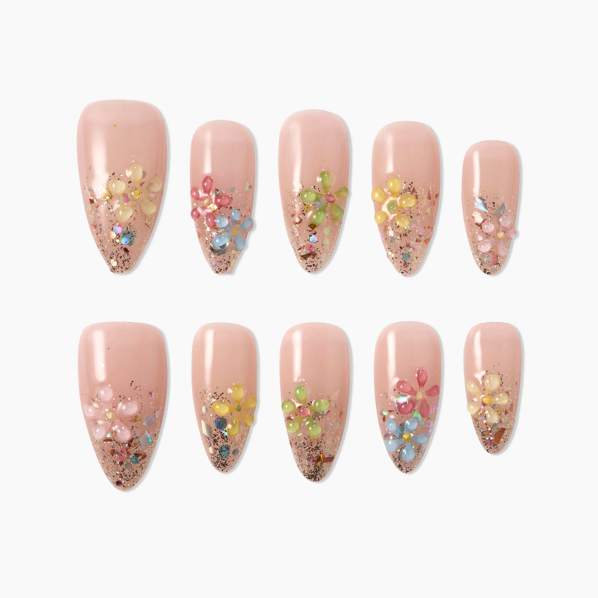 Handmade press-on nails with nude base, 3D floral designs, colorful gems, and glitter accents