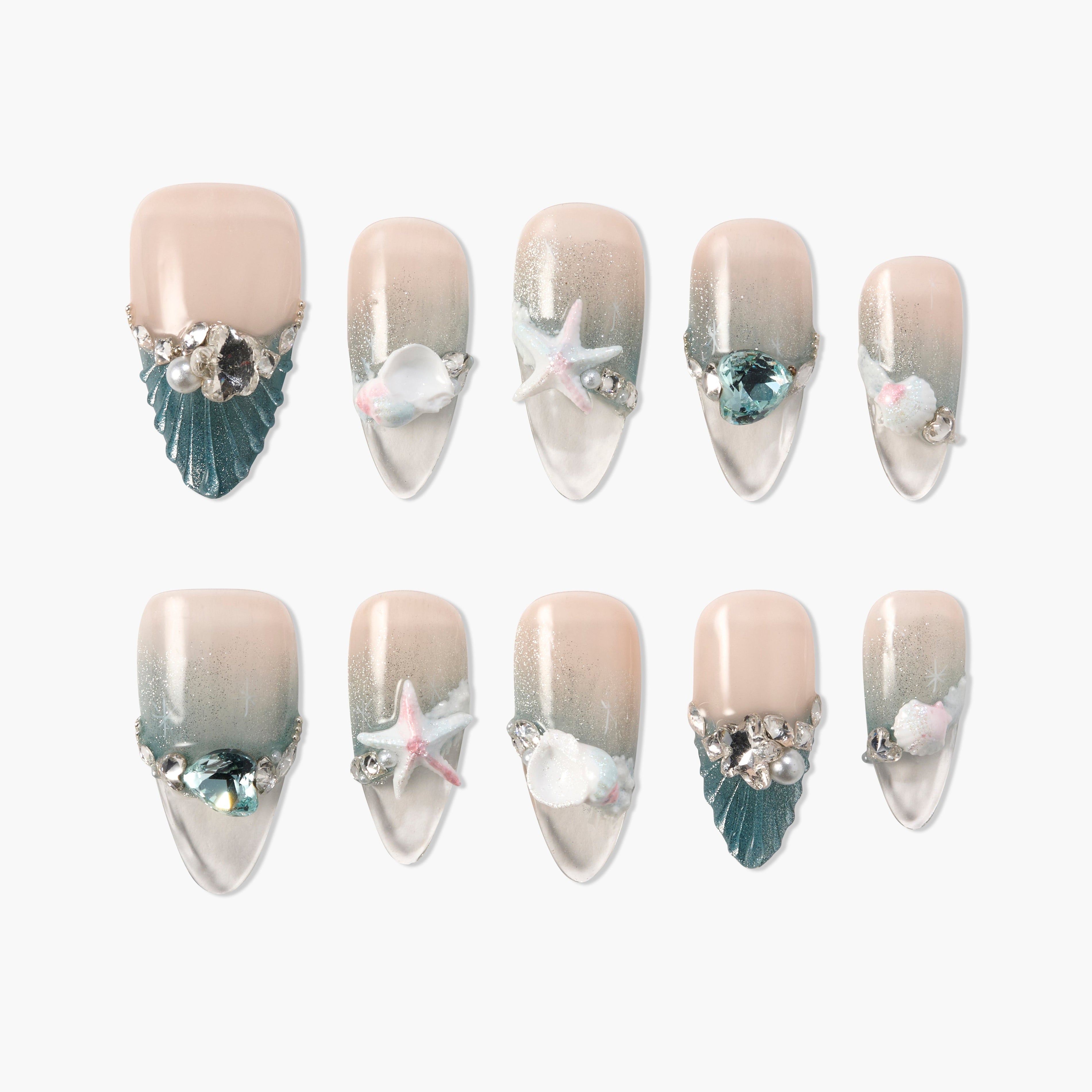 Handmade press-on nails with beach-themed 3D seashells, starfish, pearls, and crystals