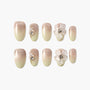 Handmade press-on nails with nude ombre, 3D floral and pearl rhinestone accents