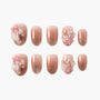 Handmade press-on nails with pink ombre, pearl 3D accents, floral and glitter design